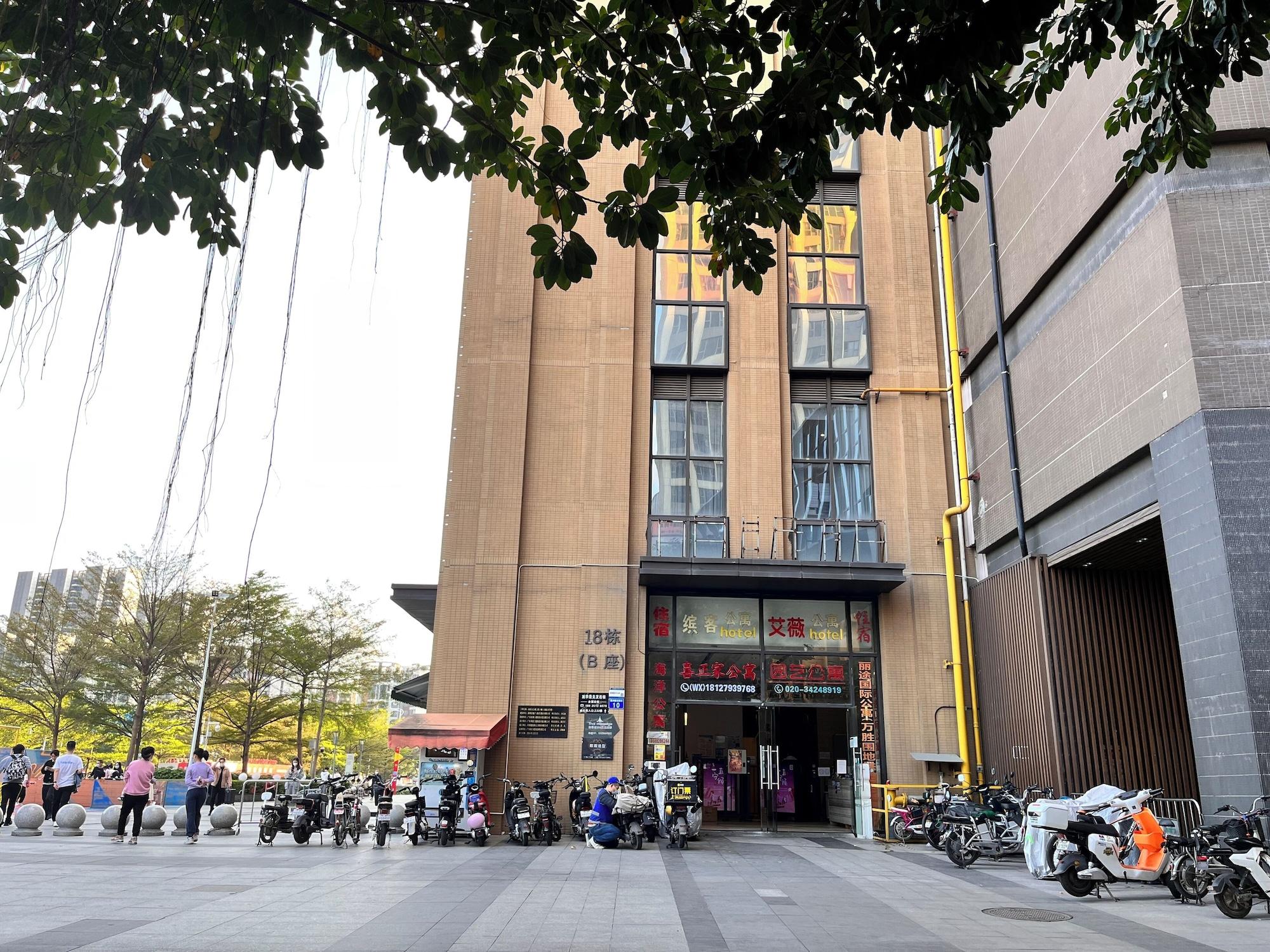 Vista Exterior Yi Long International Apartment