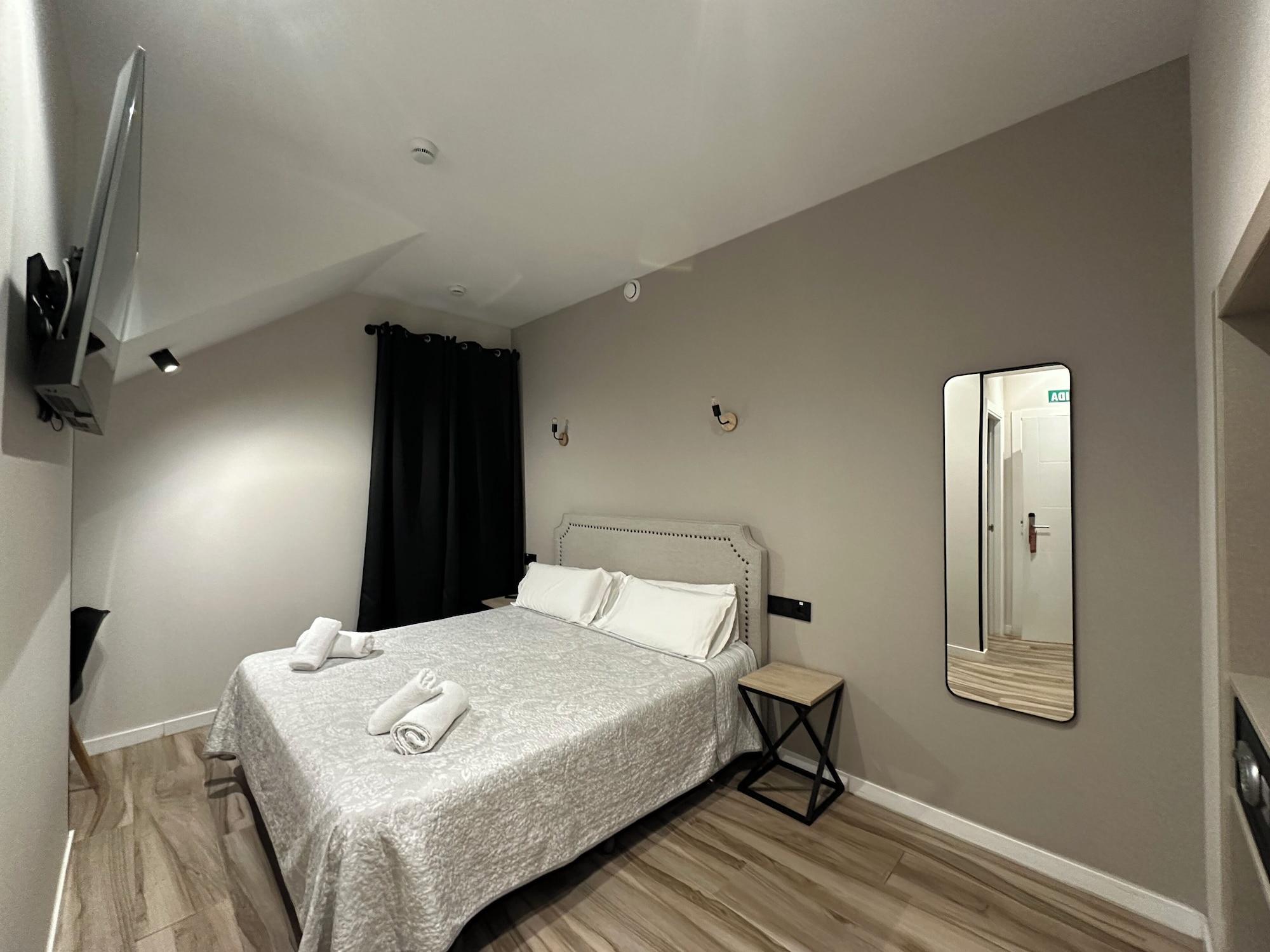 Habitación CC Opera Suites