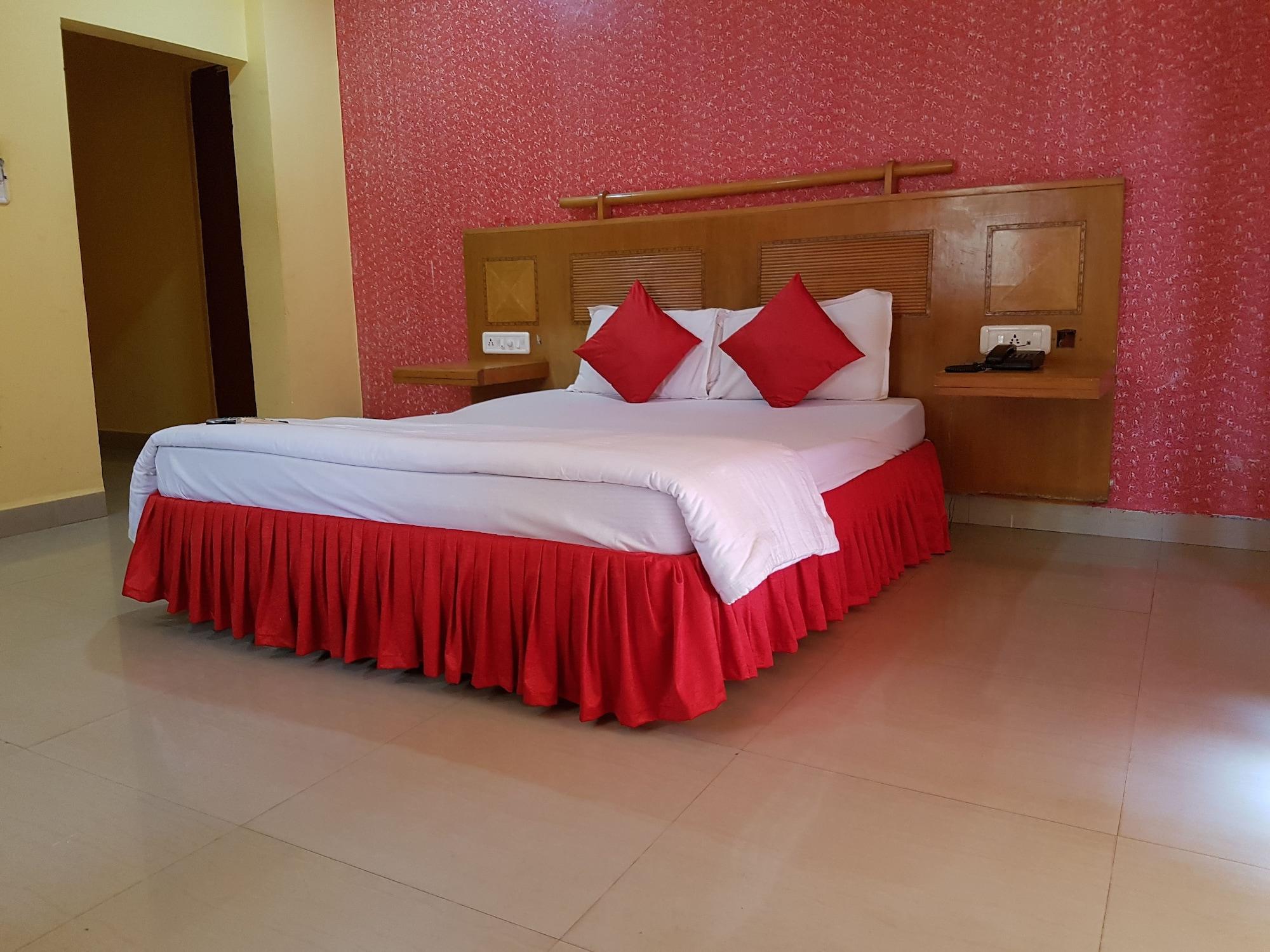 Habitación Krish Holiday Inn