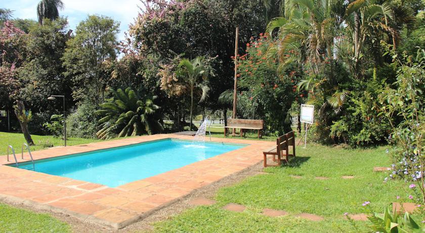 Vista da piscina Pousada das Palmeiras