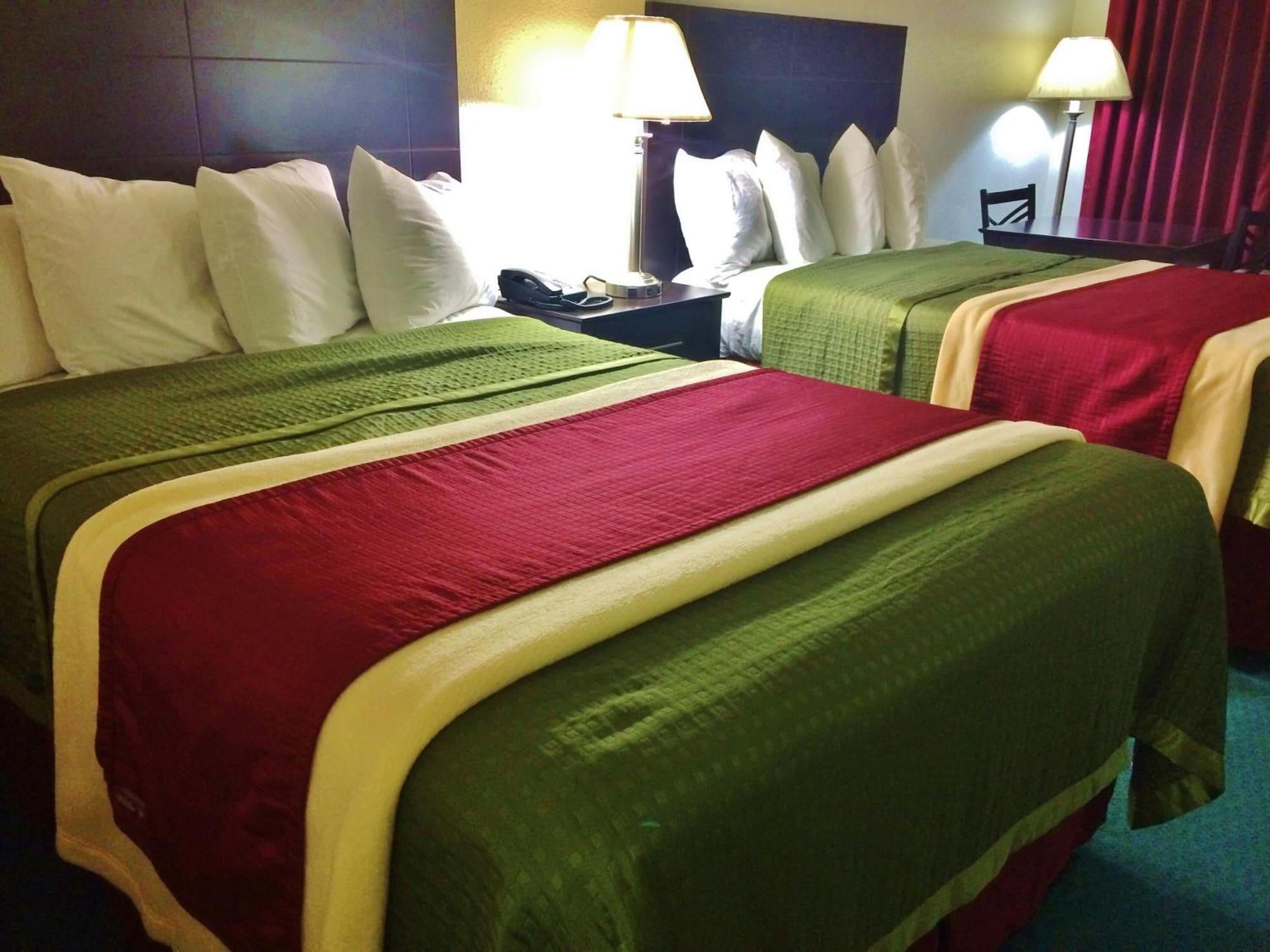 Habitación Travel Inn & Suites