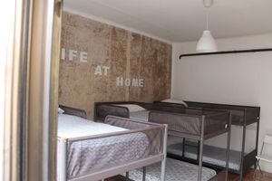 Alojamiento - Roomin Hostel