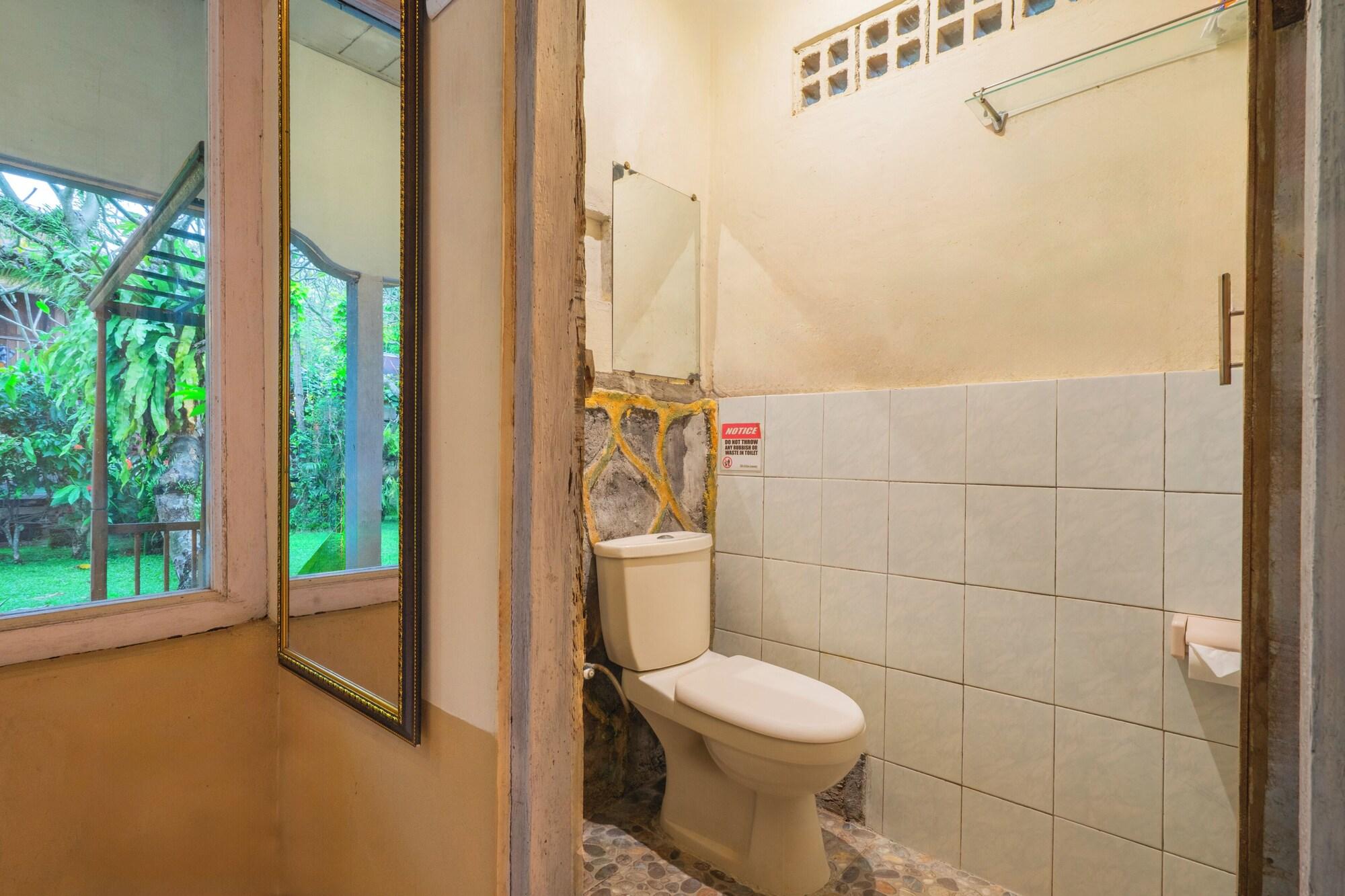 Comodidades do quarto DWM ESA di Kubu Homestay By Reccoma