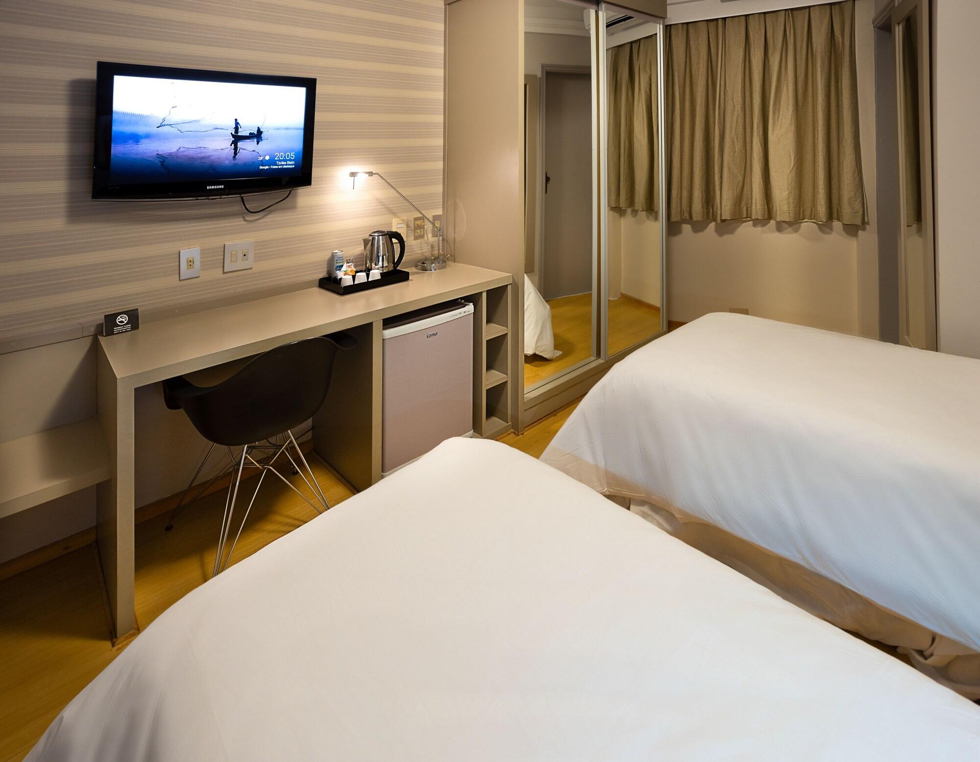 Habitación Momax Hotel