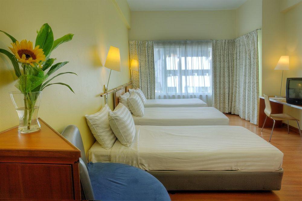 Habitación Alpha Genesis Hotel