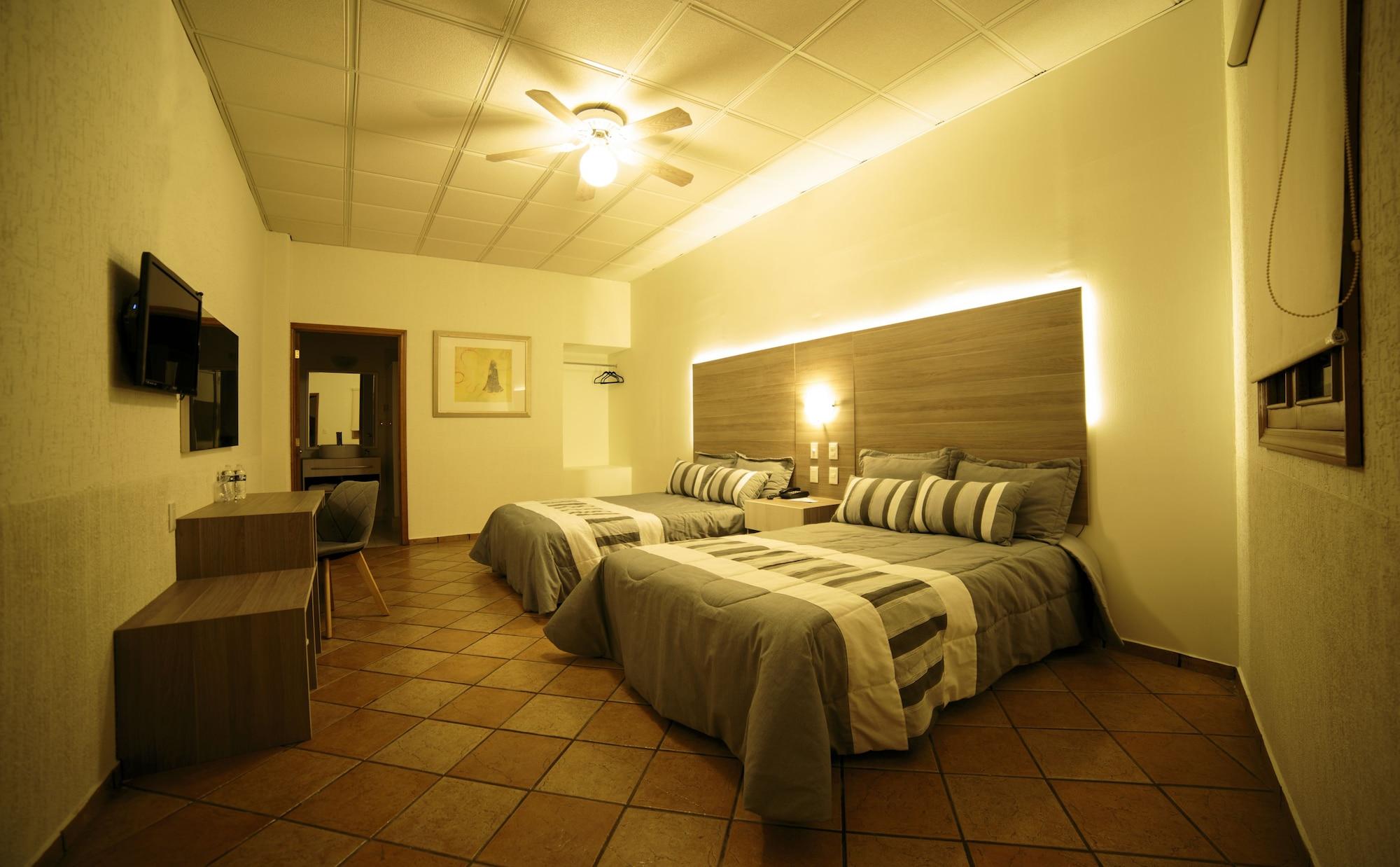 Habitación Hotel La Mansion Suiza