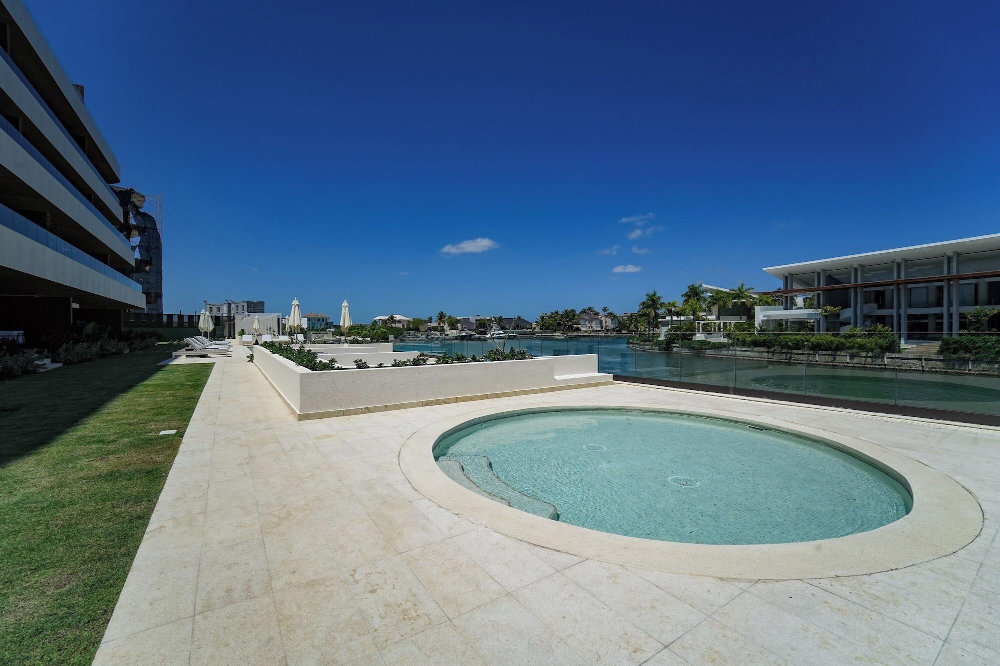 Vista Piscina Marina Garden Cap Cana by Beach Homes PC