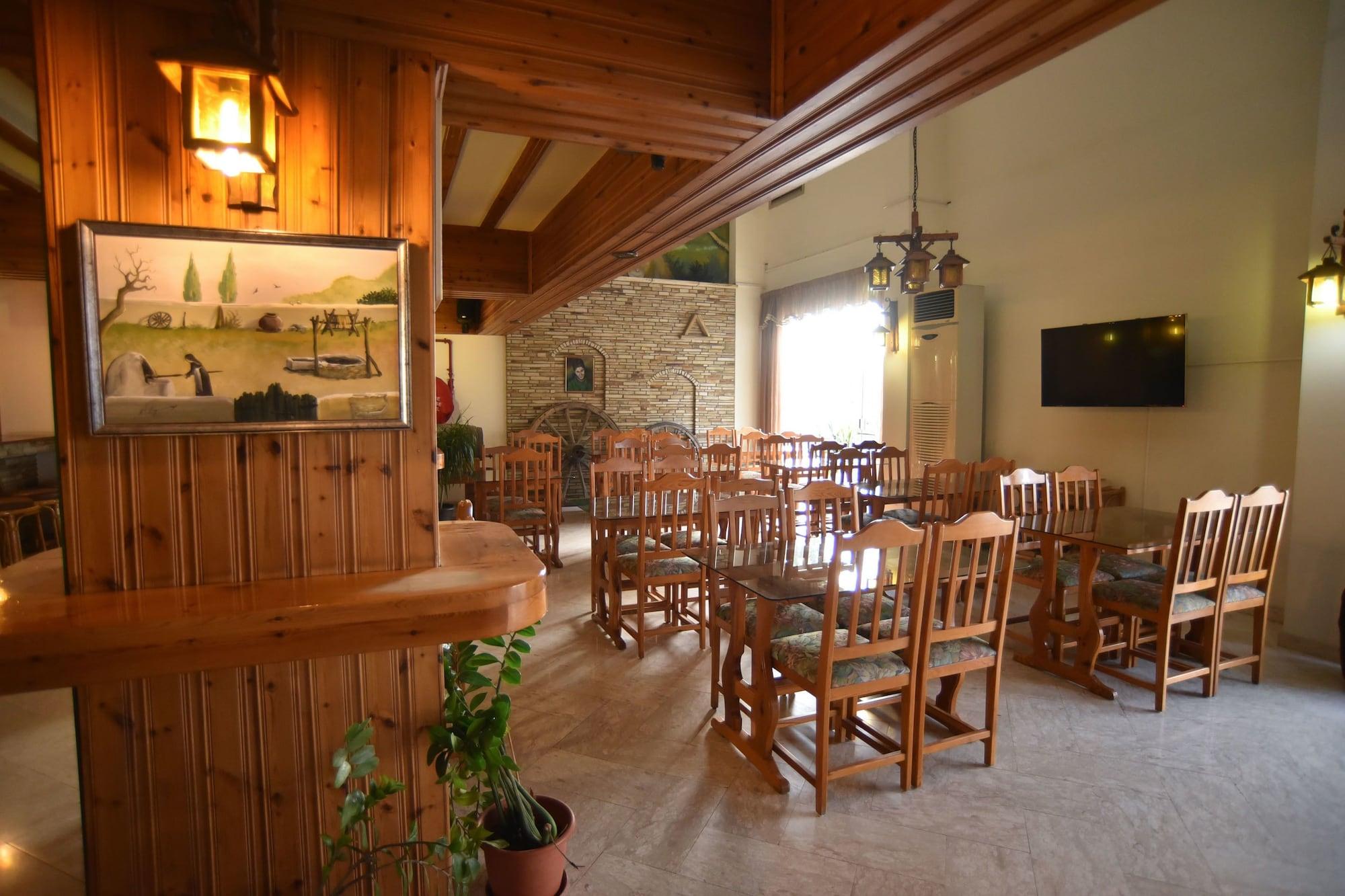 Bar/Salón Elysso Hotel