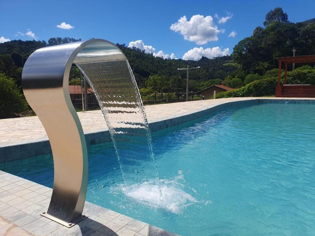Vista da piscina Pousada Thermas das Montanhas