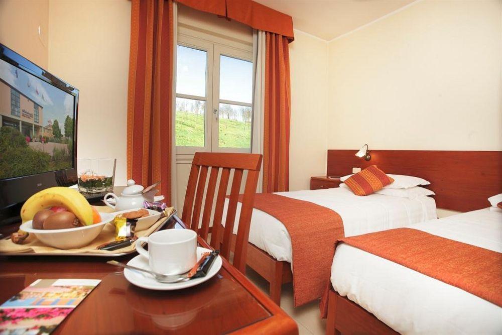 Habitación Hotel Michelangelo