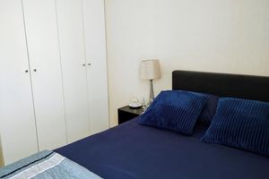 Alquiler Vacacional - Confortable Habitación con Baño Privado en Casa de Familia