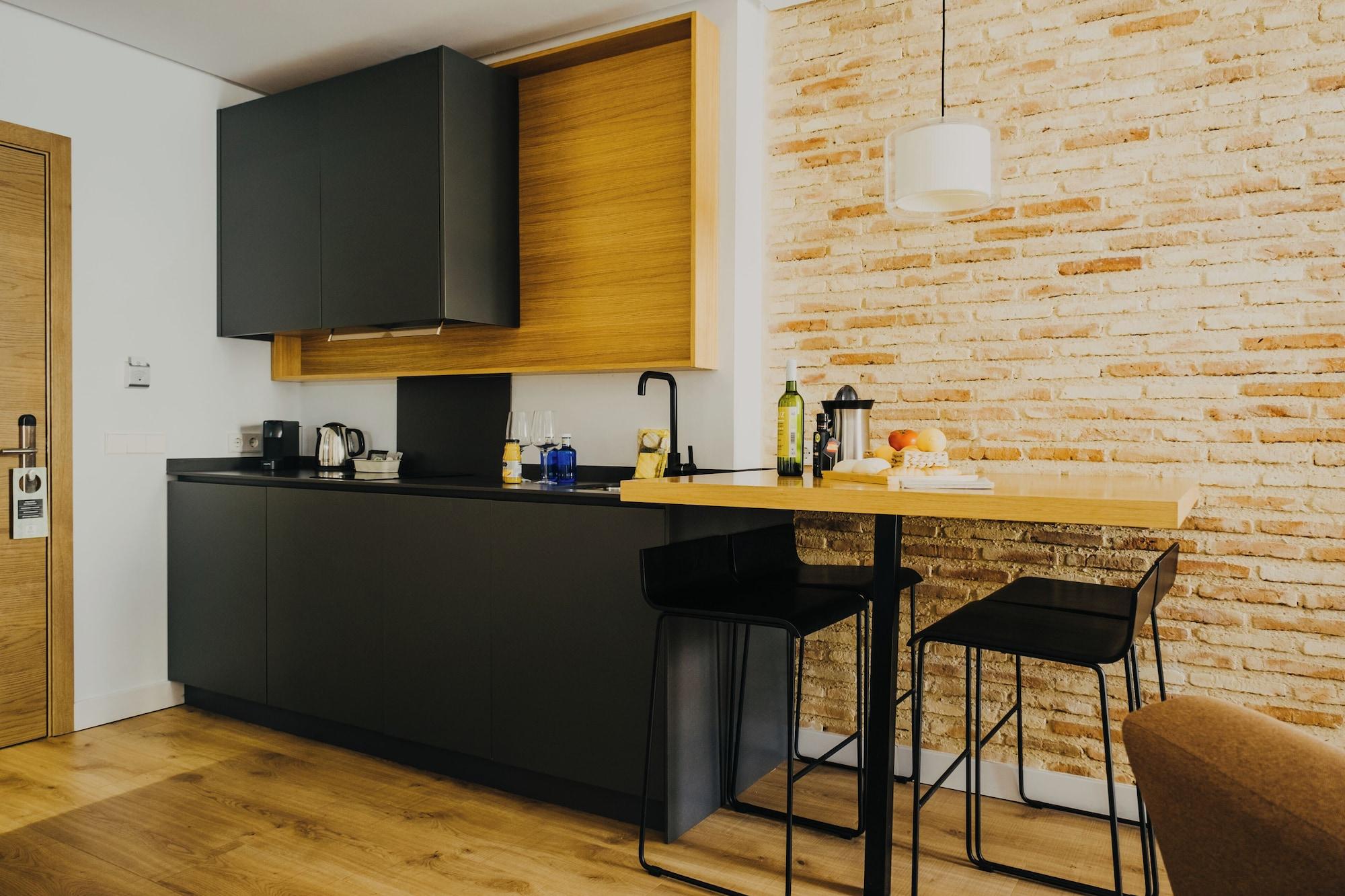 Equipamiento de Habitación Aquitania Home Suites