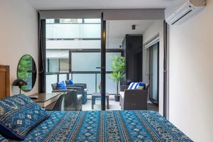 Alquiler Vacacional - Nuevo Pocitos Apartmento Lujo w/King Beds, 3 Smart TVs, W/D, WiFi, Rooftop Pool.