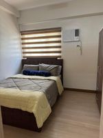 Alquiler Vacacional - Cozy 1-bedroom condo with AC and WiFi in enjoyable Quezon City