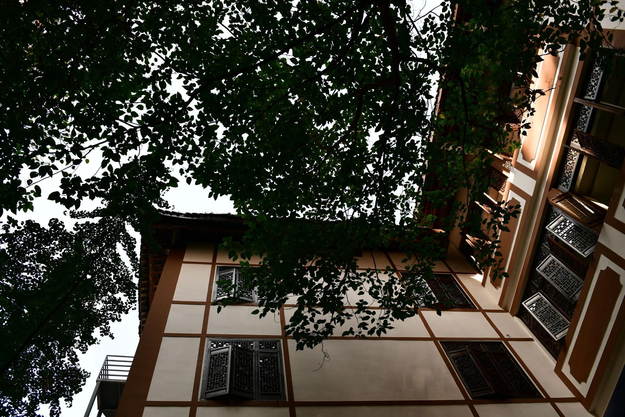 Vista Exterior XISHU GARDEN INN