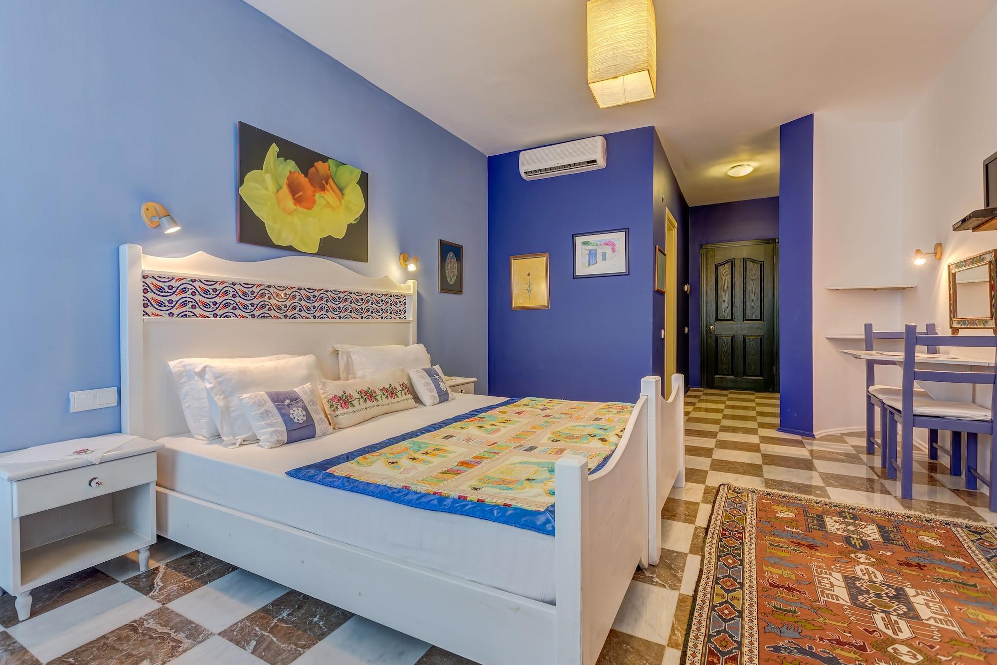 Habitación Villa Asina