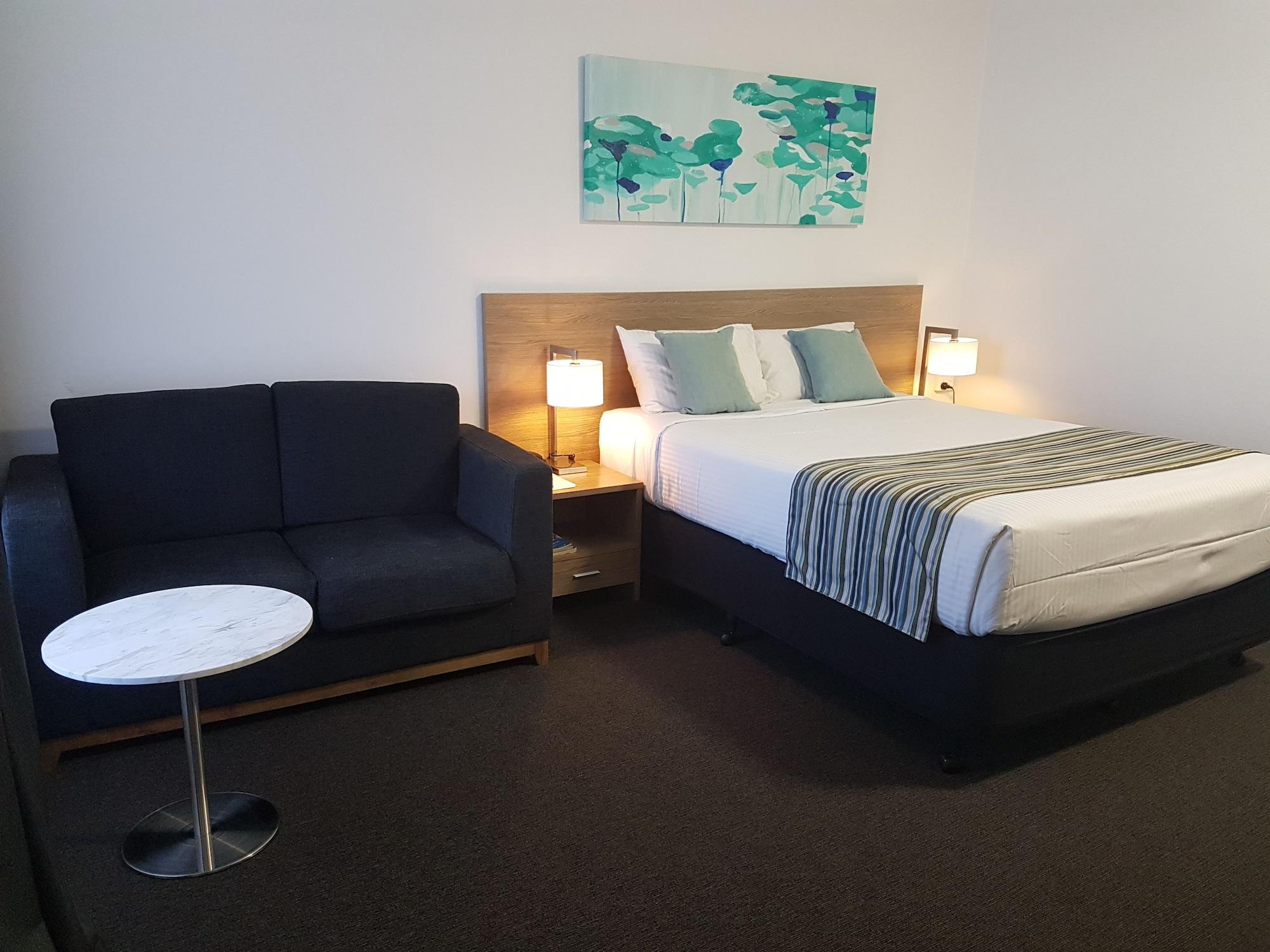 Habitación Mid City Motor Inn