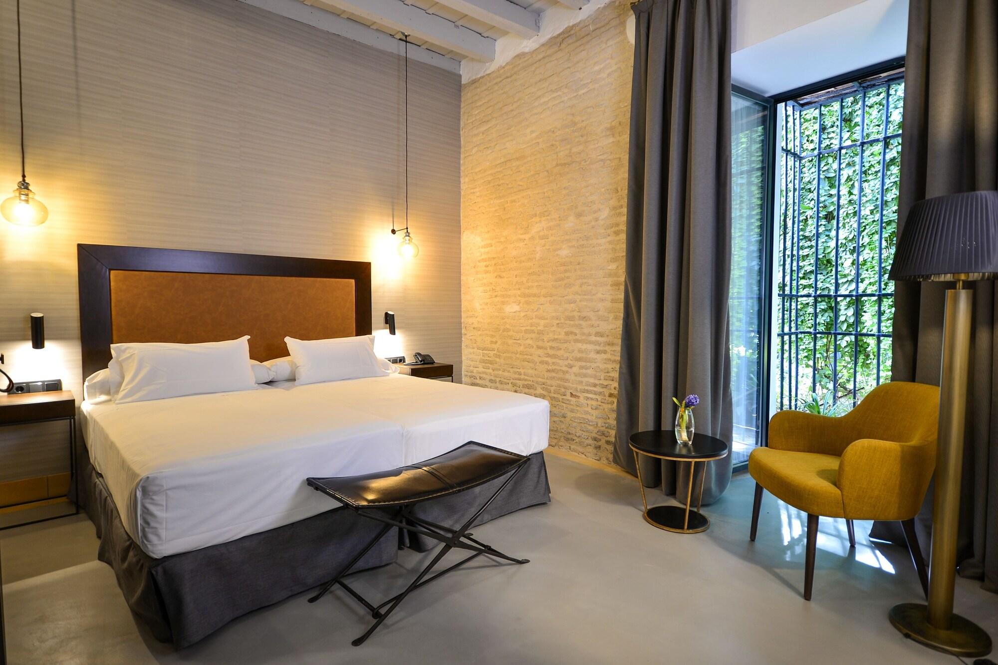 Habitación Legado Alcázar Hotel