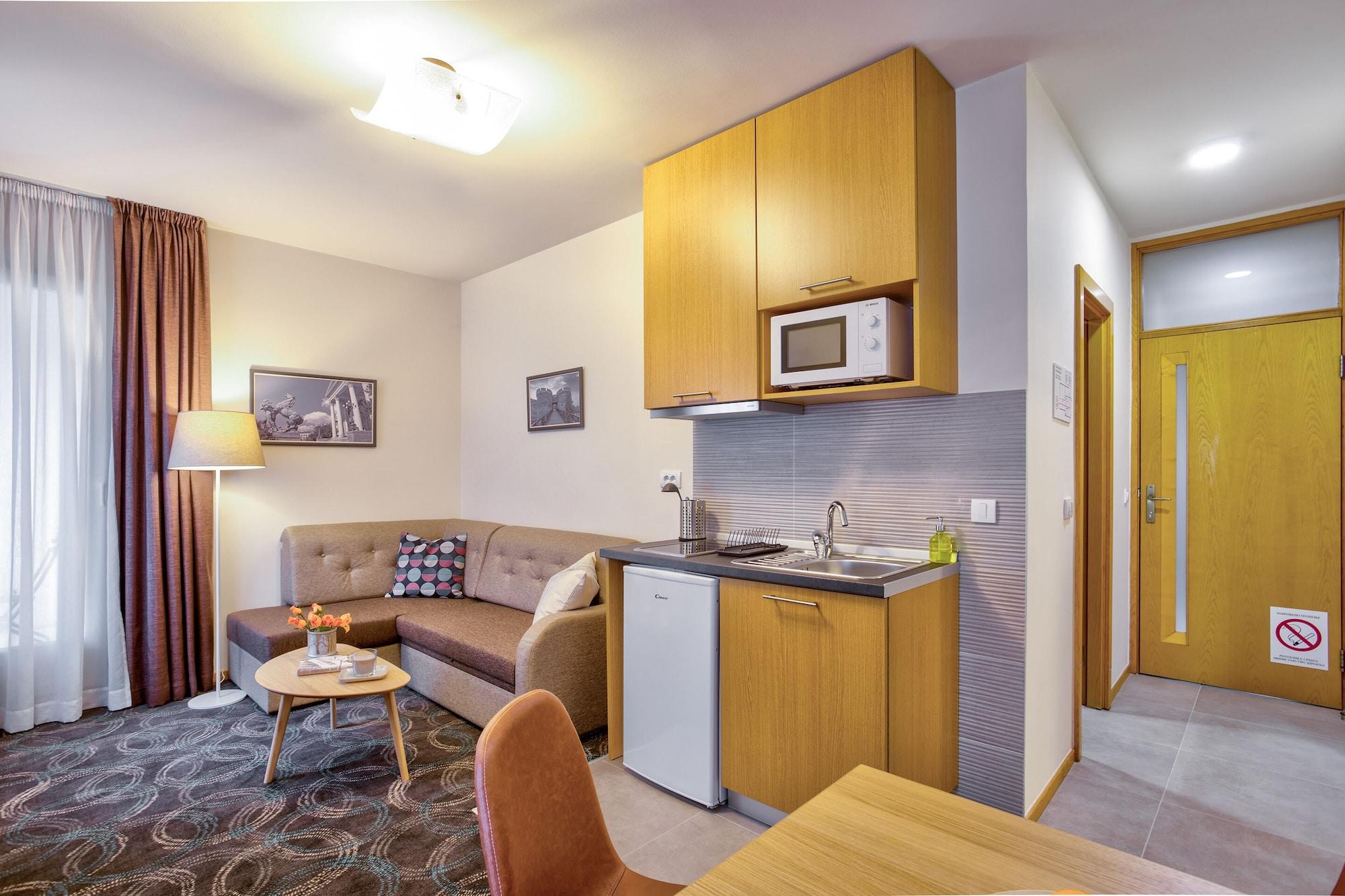 Equipamiento de Habitación Booking Apartments