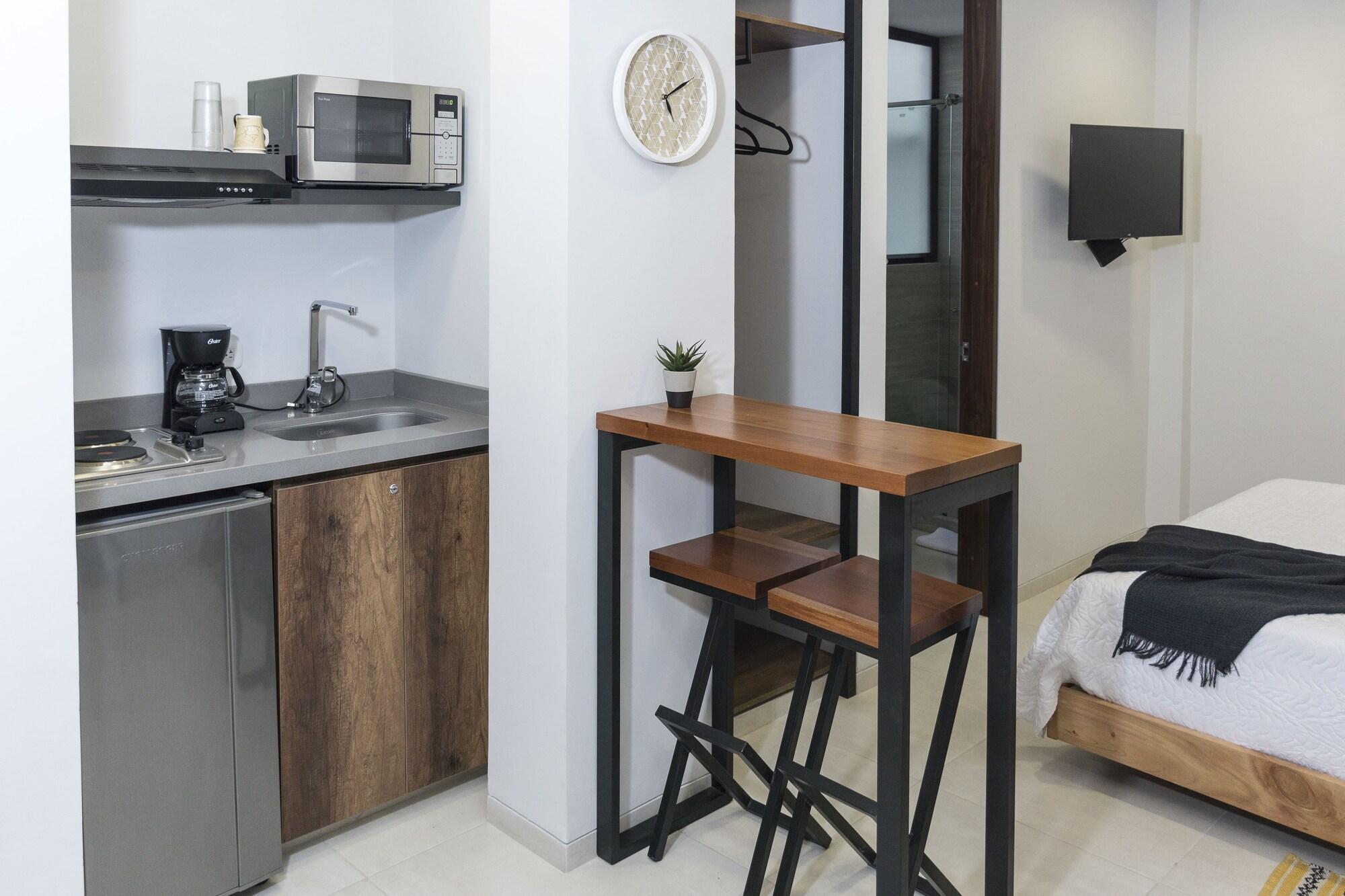 Equipamiento de Habitación Kapital Suites
