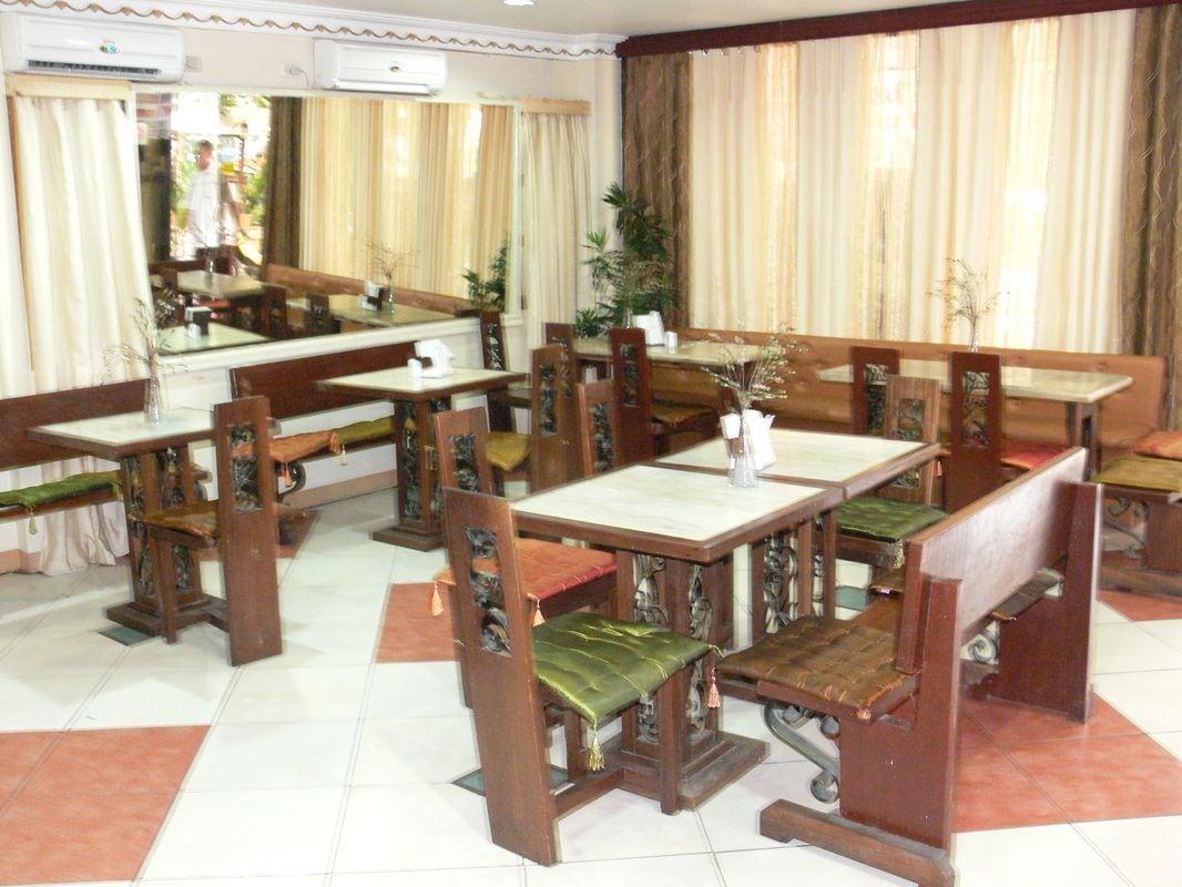 Restaurant Plaza Maria Luisa Suites Inn