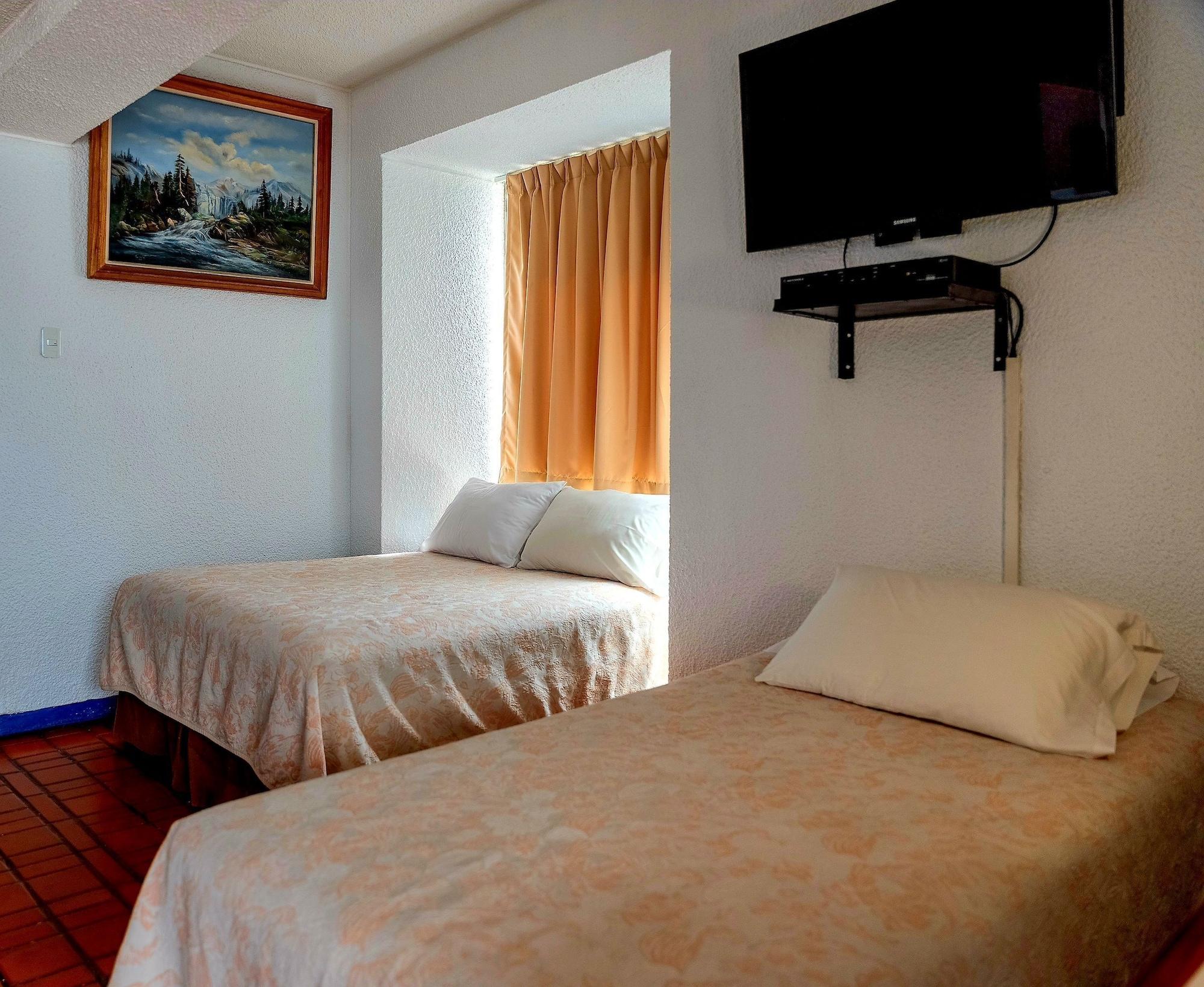 Habitación Savoy Inn