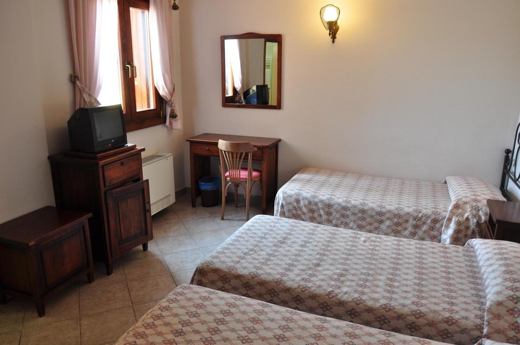 Habitación Leo Hotel