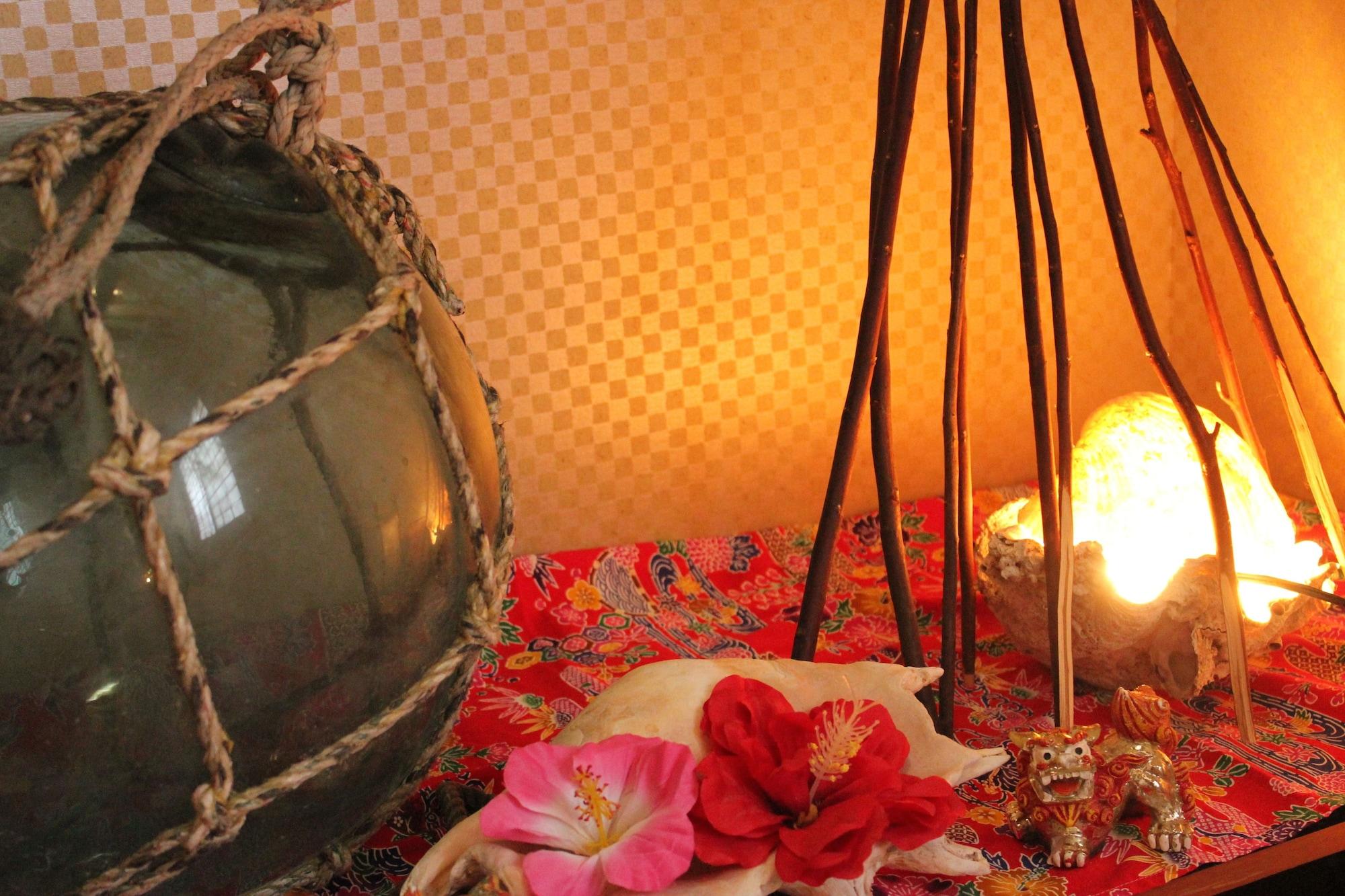 Habitación Okinawa Minshuku Kariyushi Honkan