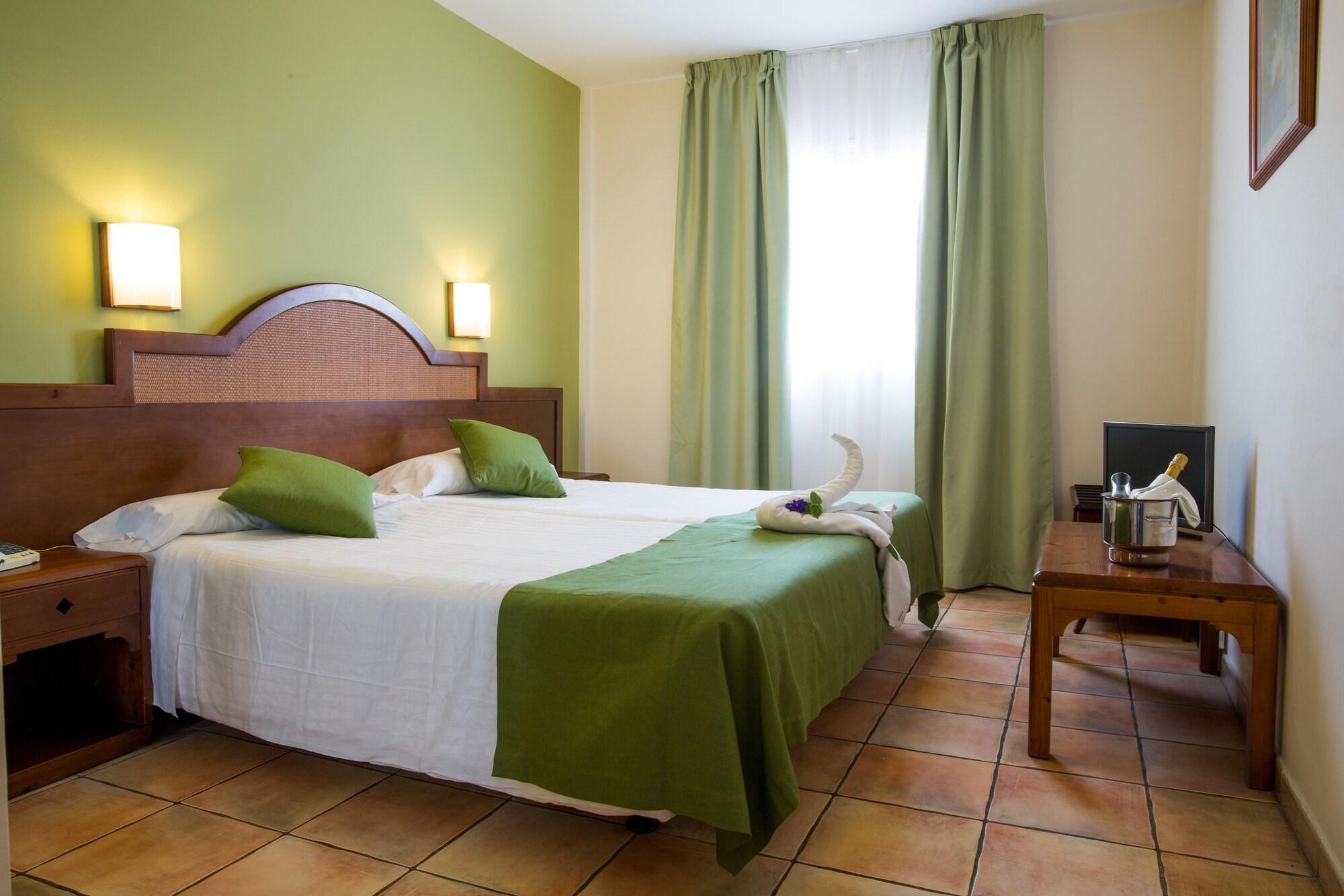 Habitación Apartamentos la Caleta