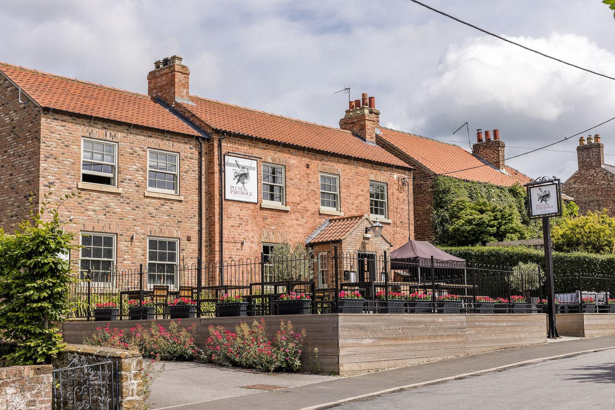 Varios Plum and Partridge Inn