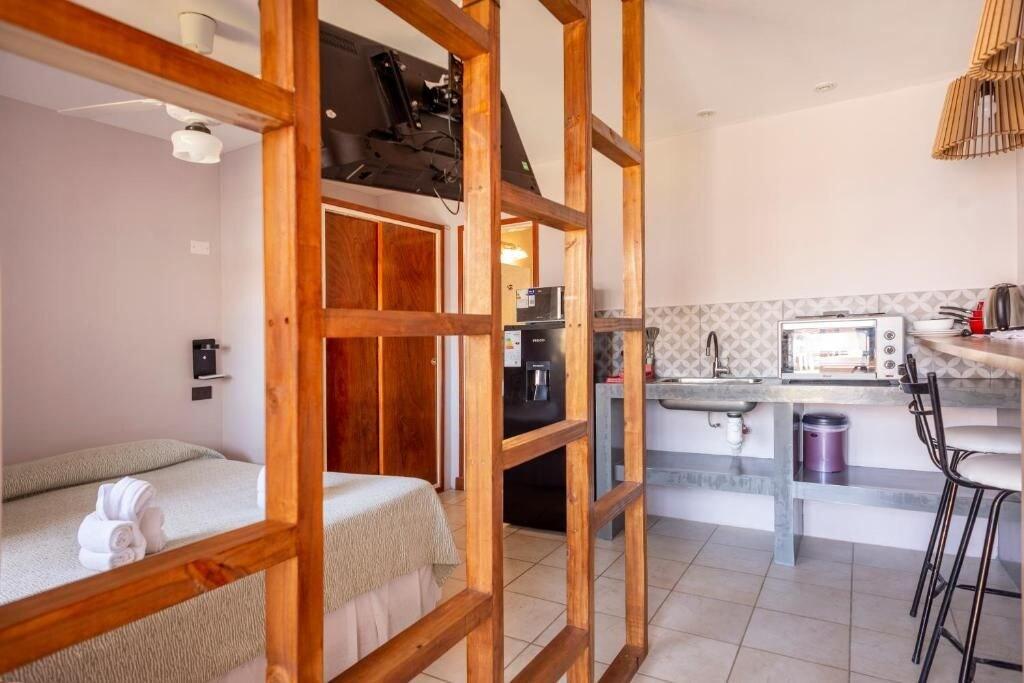 Quarto Hotel Rideamus