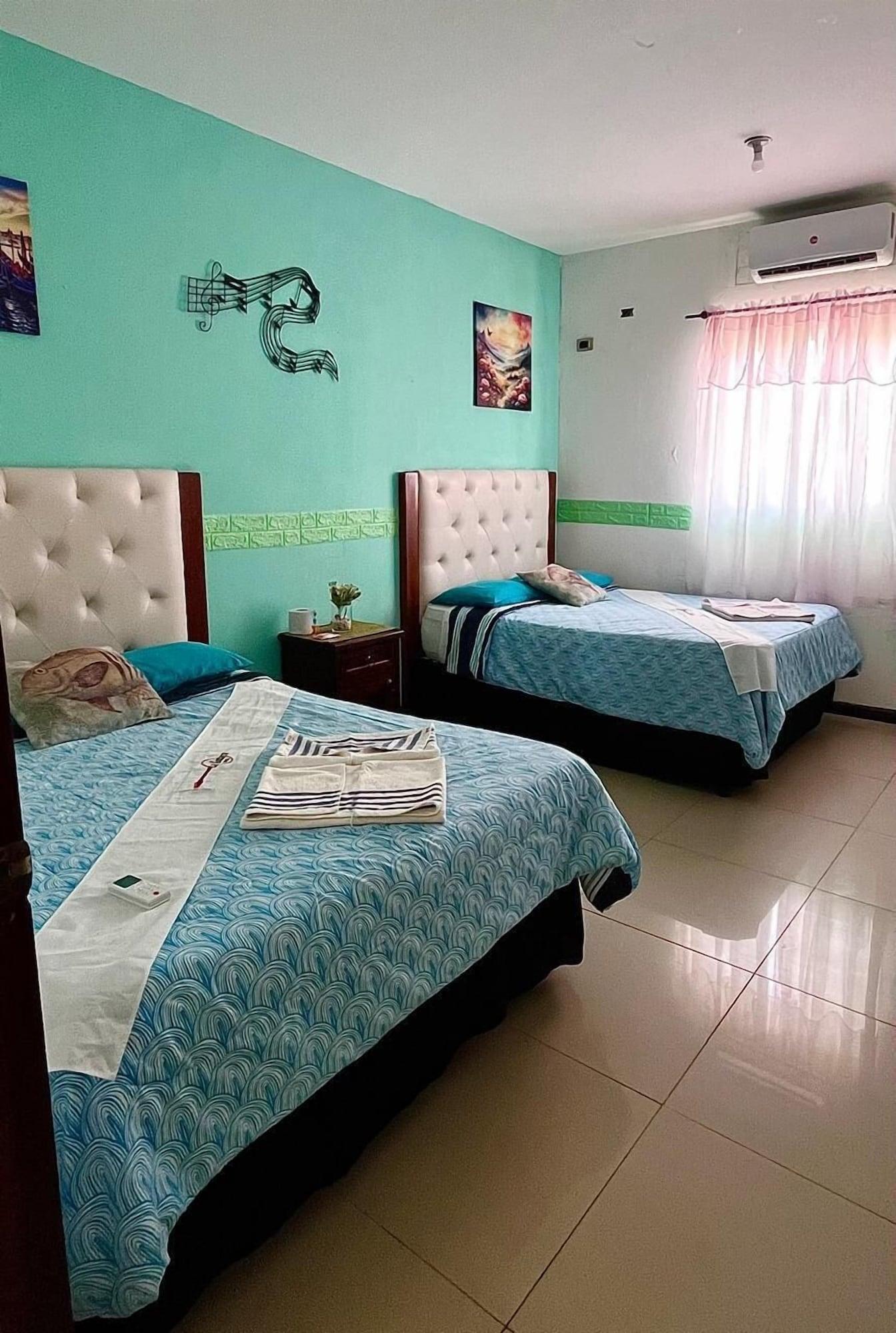 Habitación Hotel nuevo amanecer