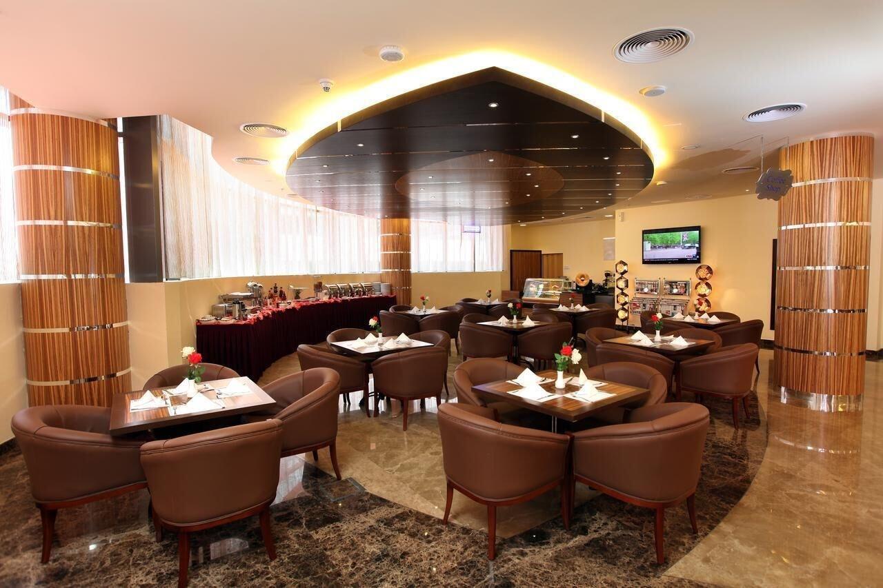 Restaurant Xclusive Maples Hotel Apartment