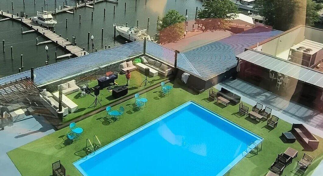 Vista Piscina The Landing at Hampton Marina, Tapestry Collection by Hilton