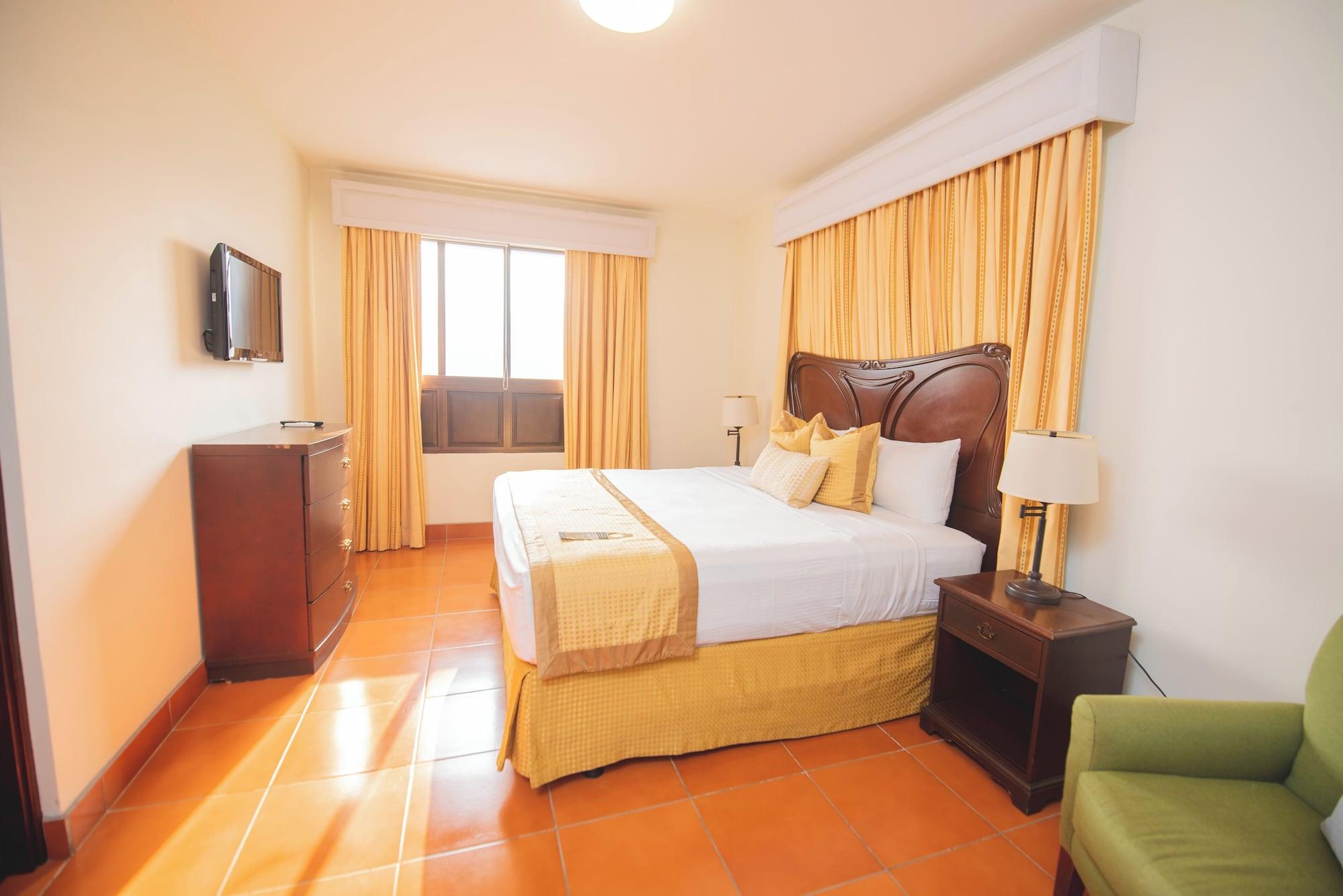 Quarto Hotel Los Portales