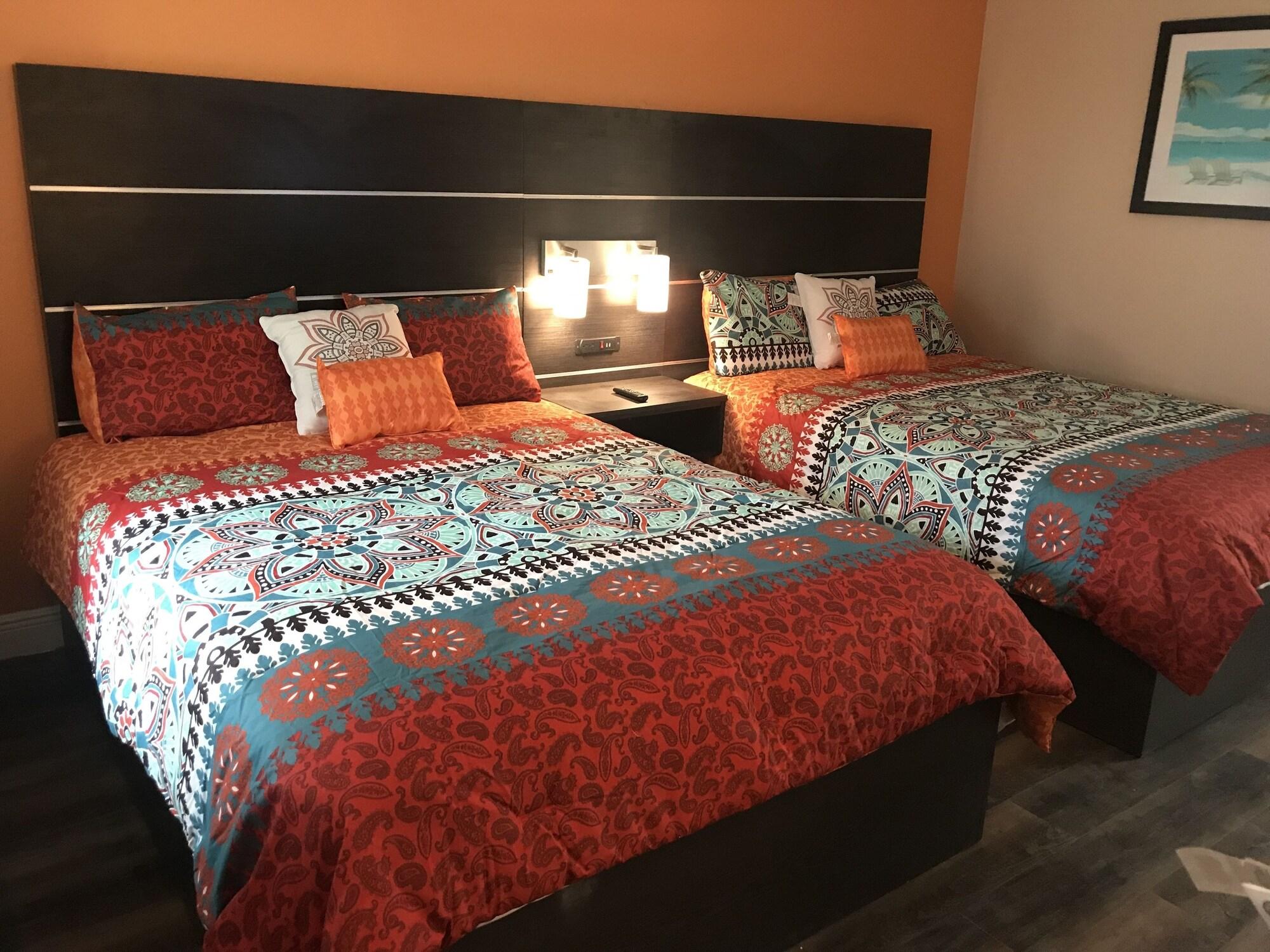Habitación Tropical Inn & Suites