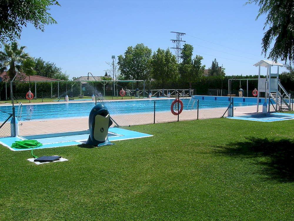 Vista da piscina Hostal Pechi