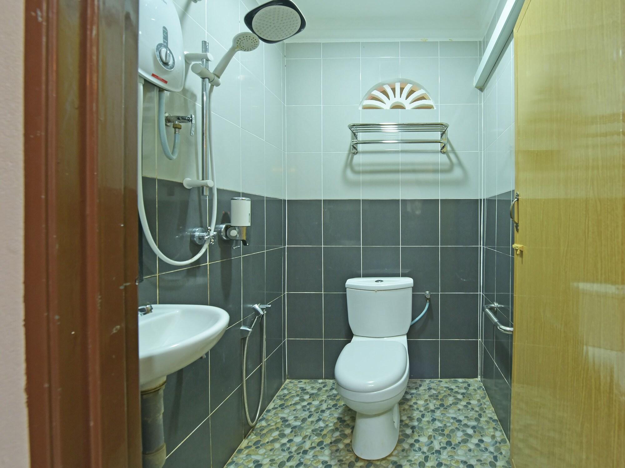 Equipamiento de Habitación OYO 90642 Twin Mutiara Chalet &Homestay