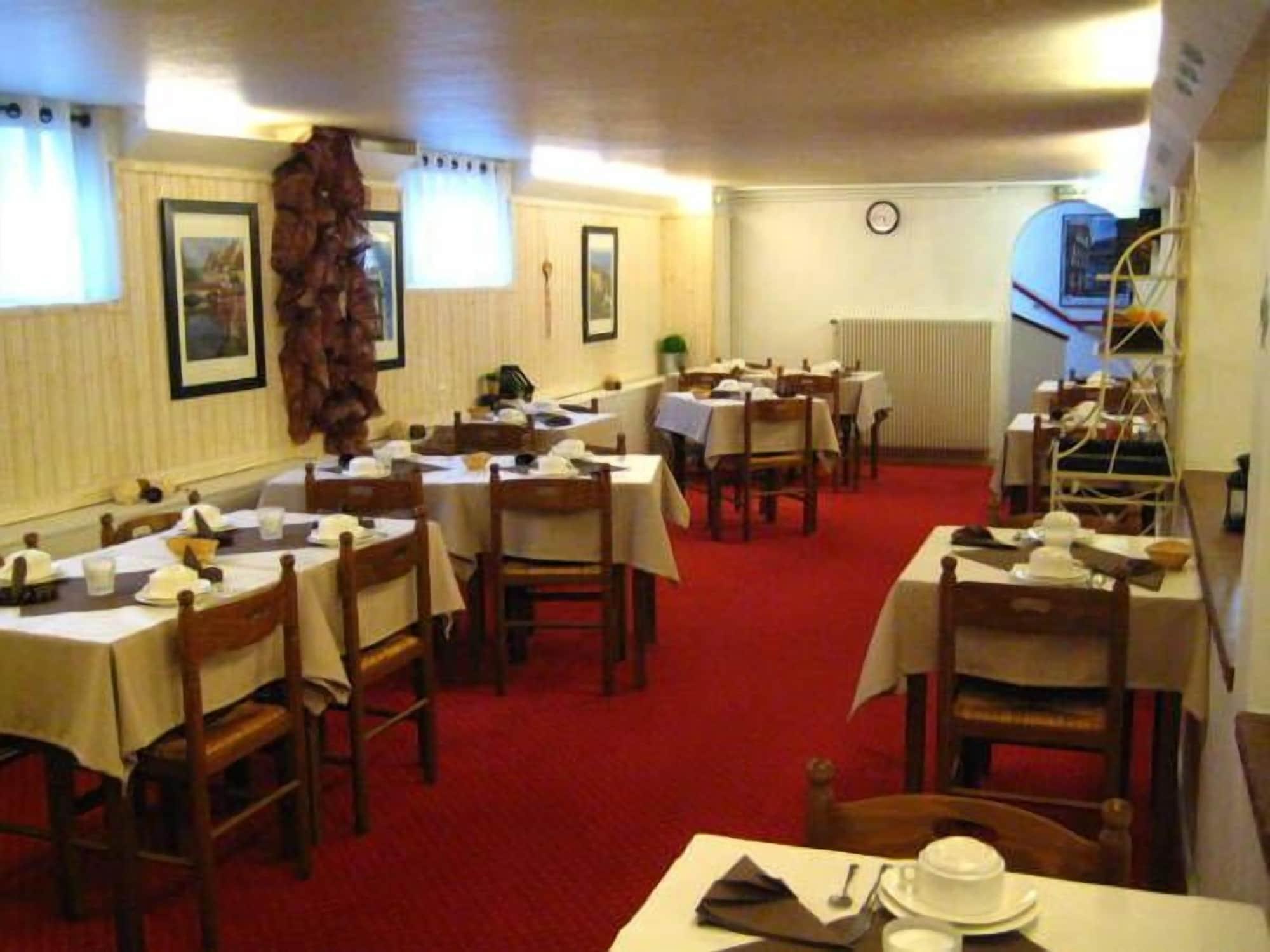 Área de desayuno Hôtel Le Domino