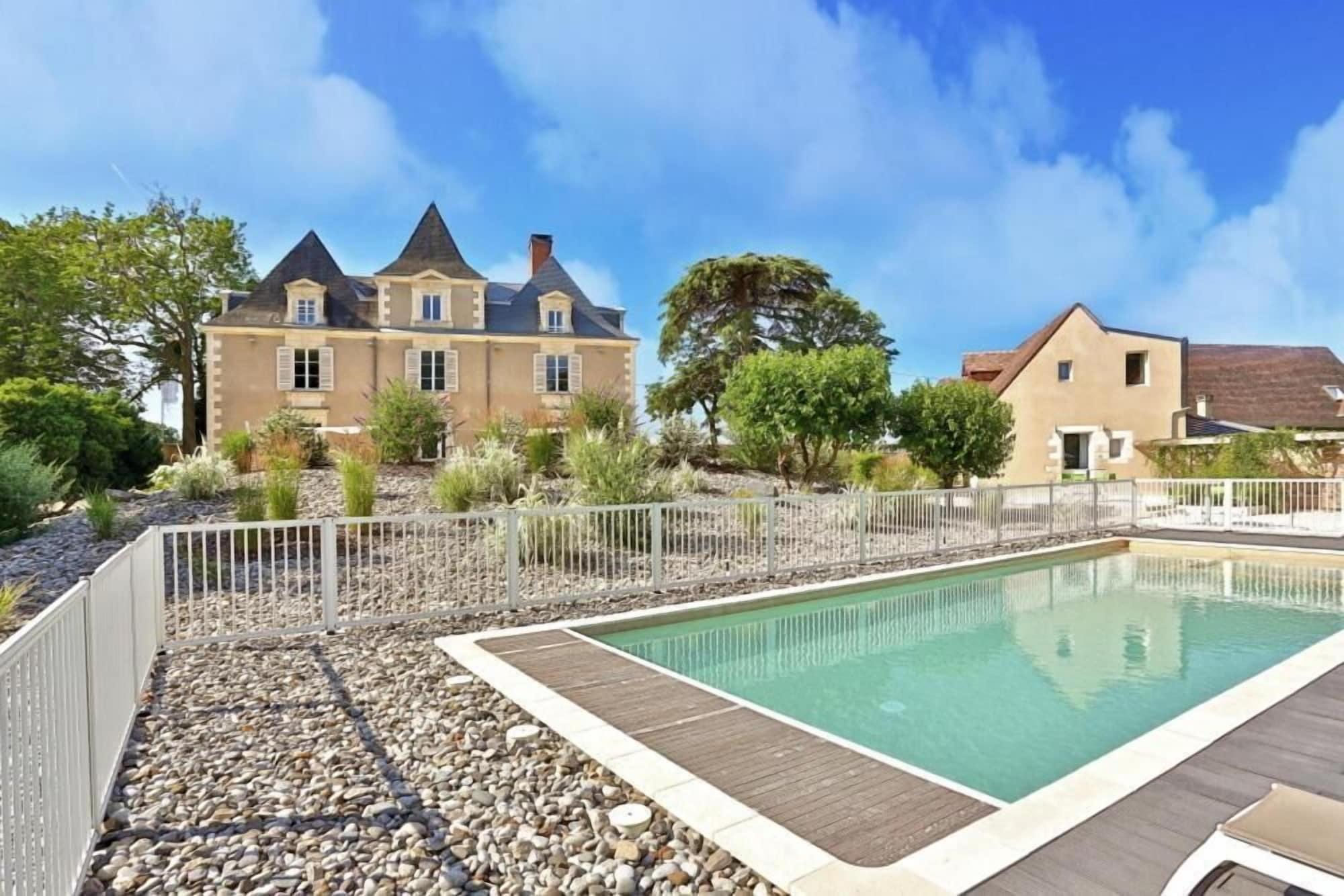 Vista Piscina Le Manoir des Cèdres