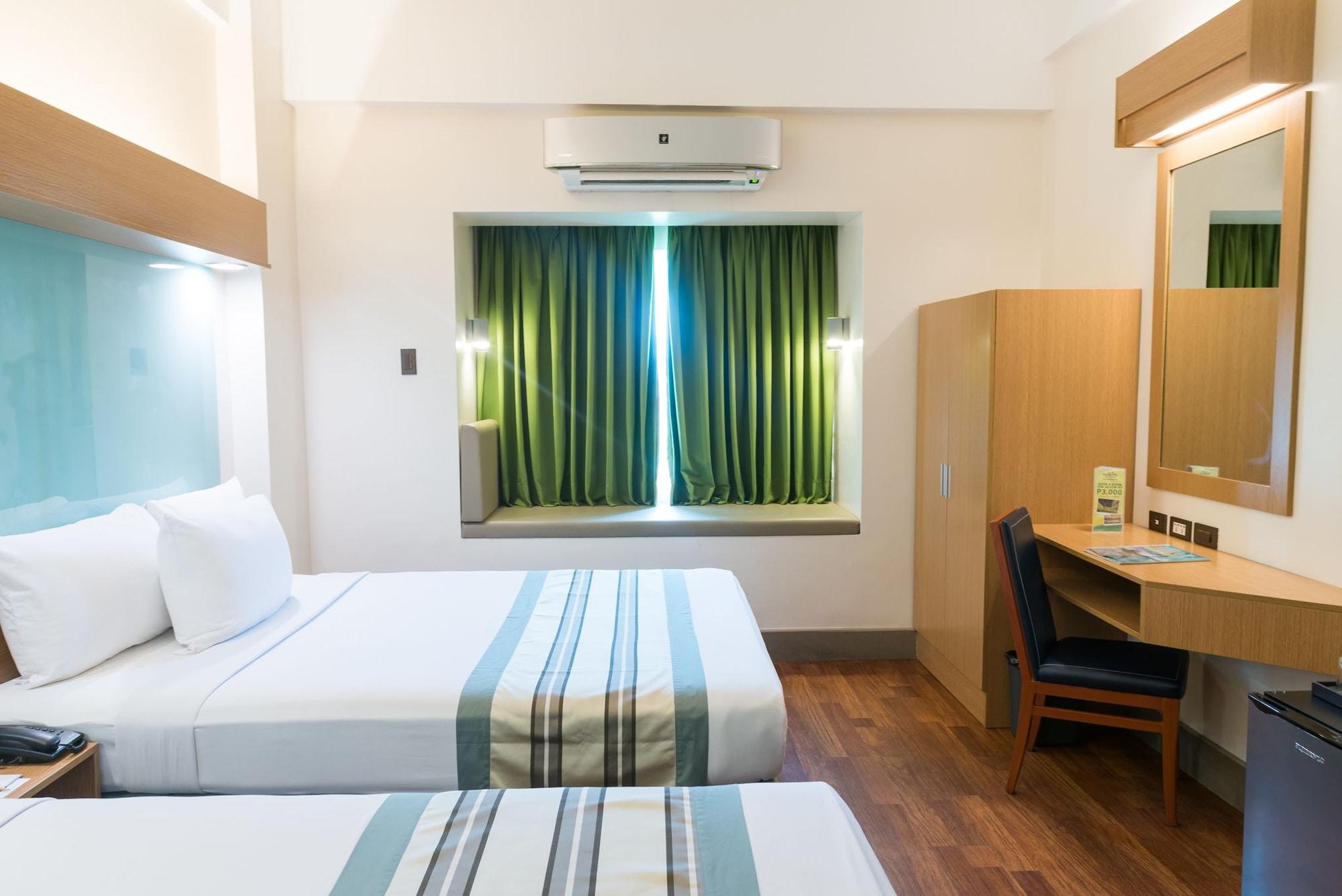 Habitación Microtel by Wyndham South Forbes near Nuvali