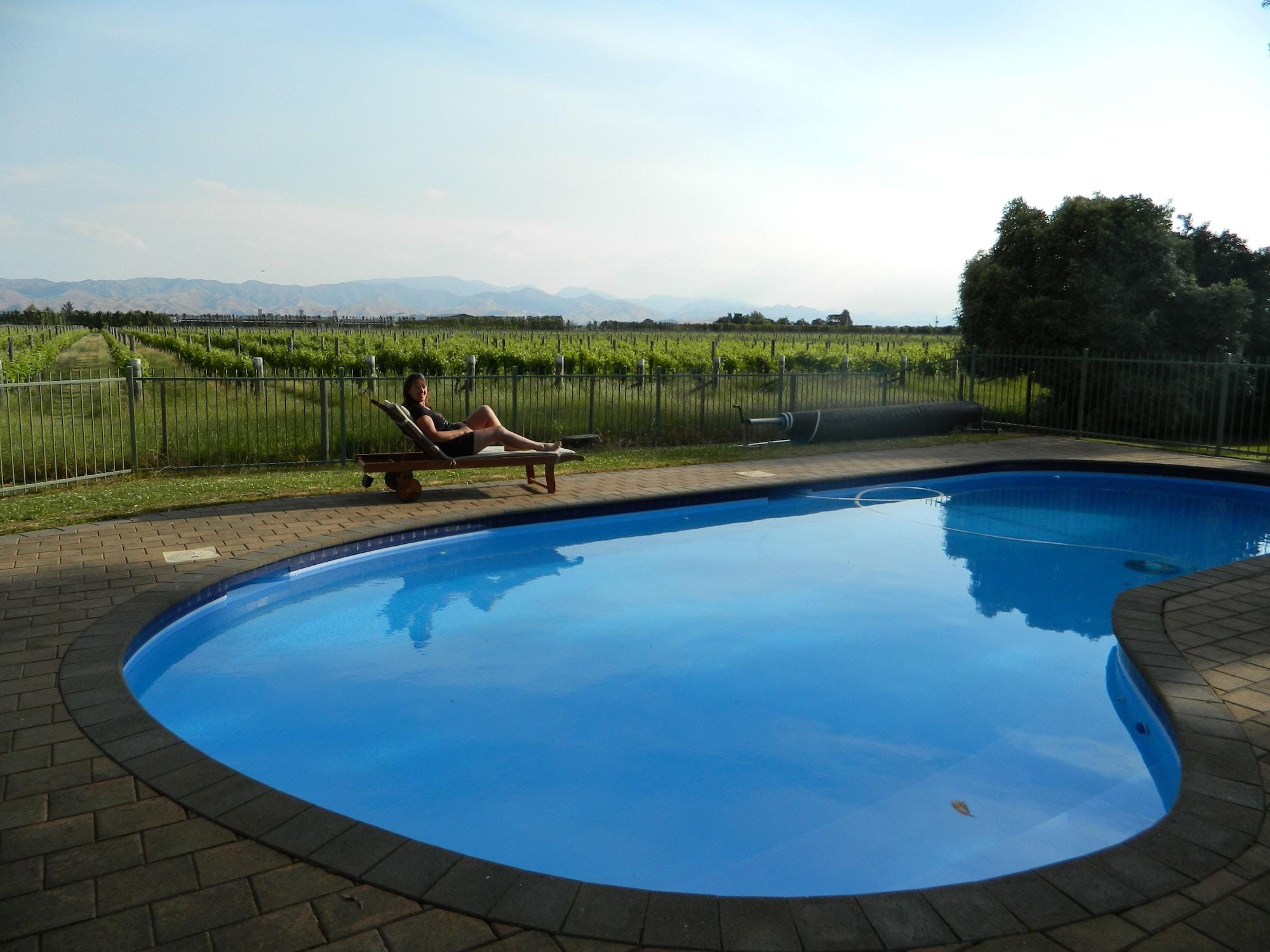 Vista Piscina Antares Homestay