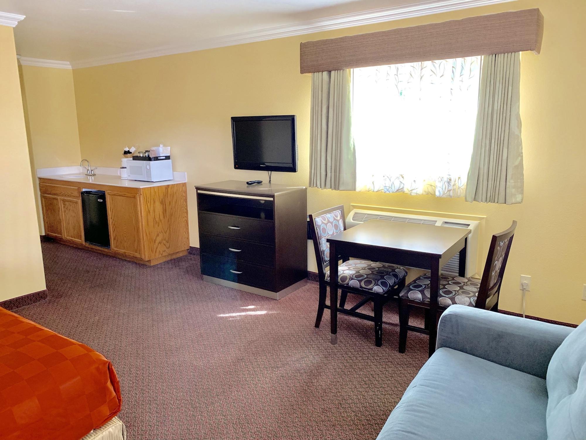 Habitación Olive Tree Inn & Suites