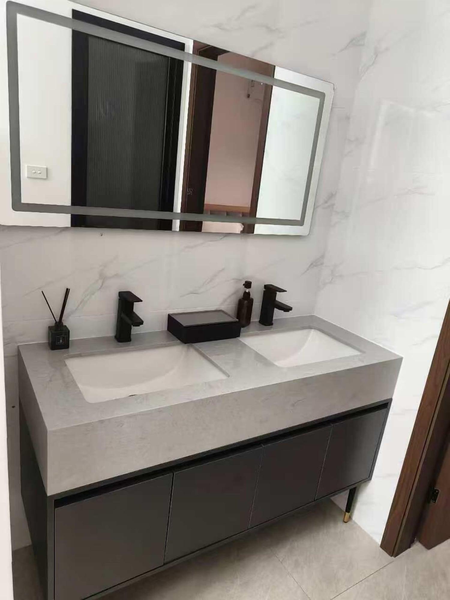 Equipamiento de Habitación Xiaos Henderson Hotel