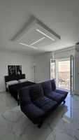 Alquiler Vacacional - Modern Hillside Retreat with Panoramic Views & Private Balcony with AC
