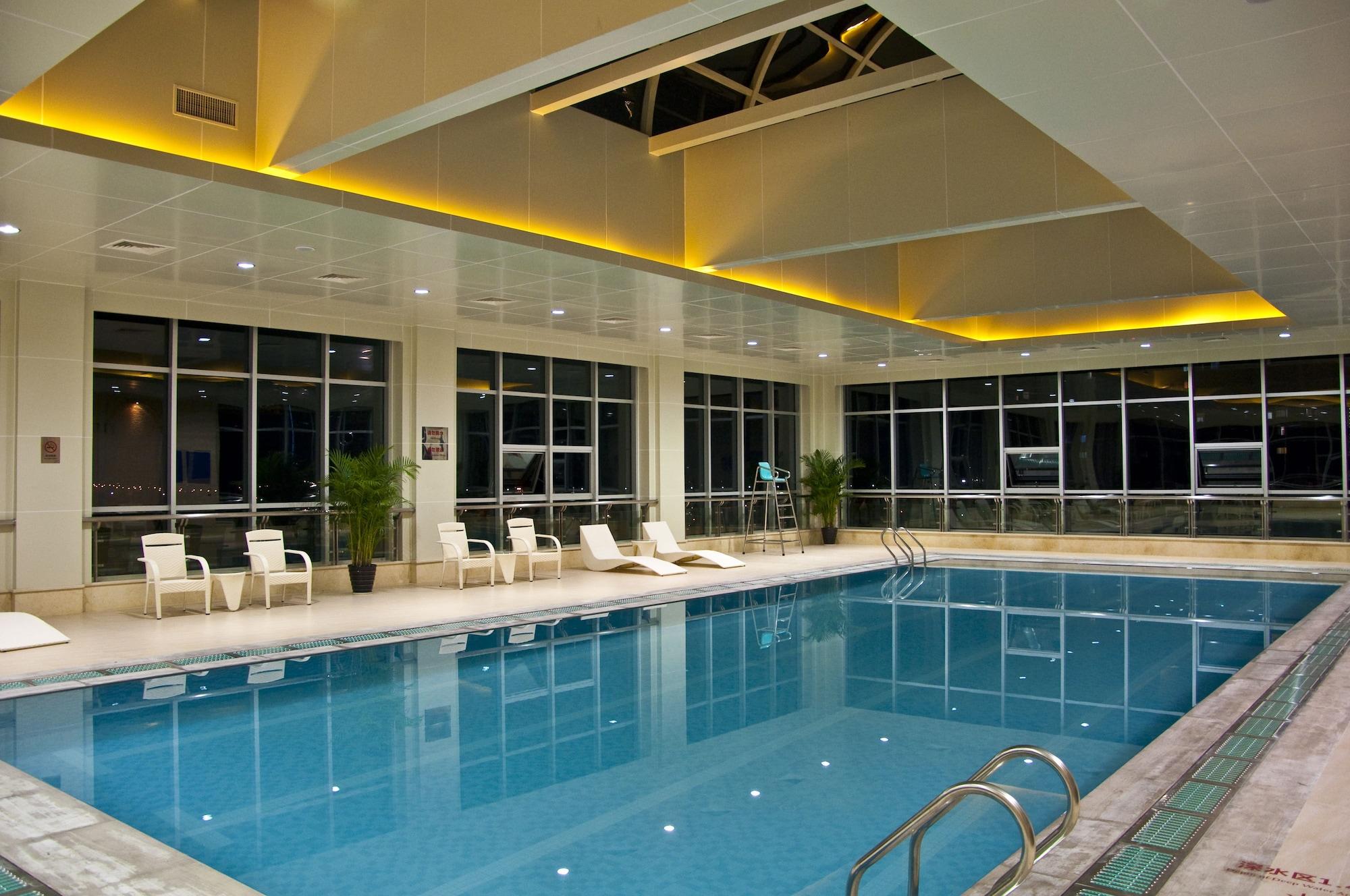 Vista Piscina Grand New Century Hotel Ninghai Jinhai