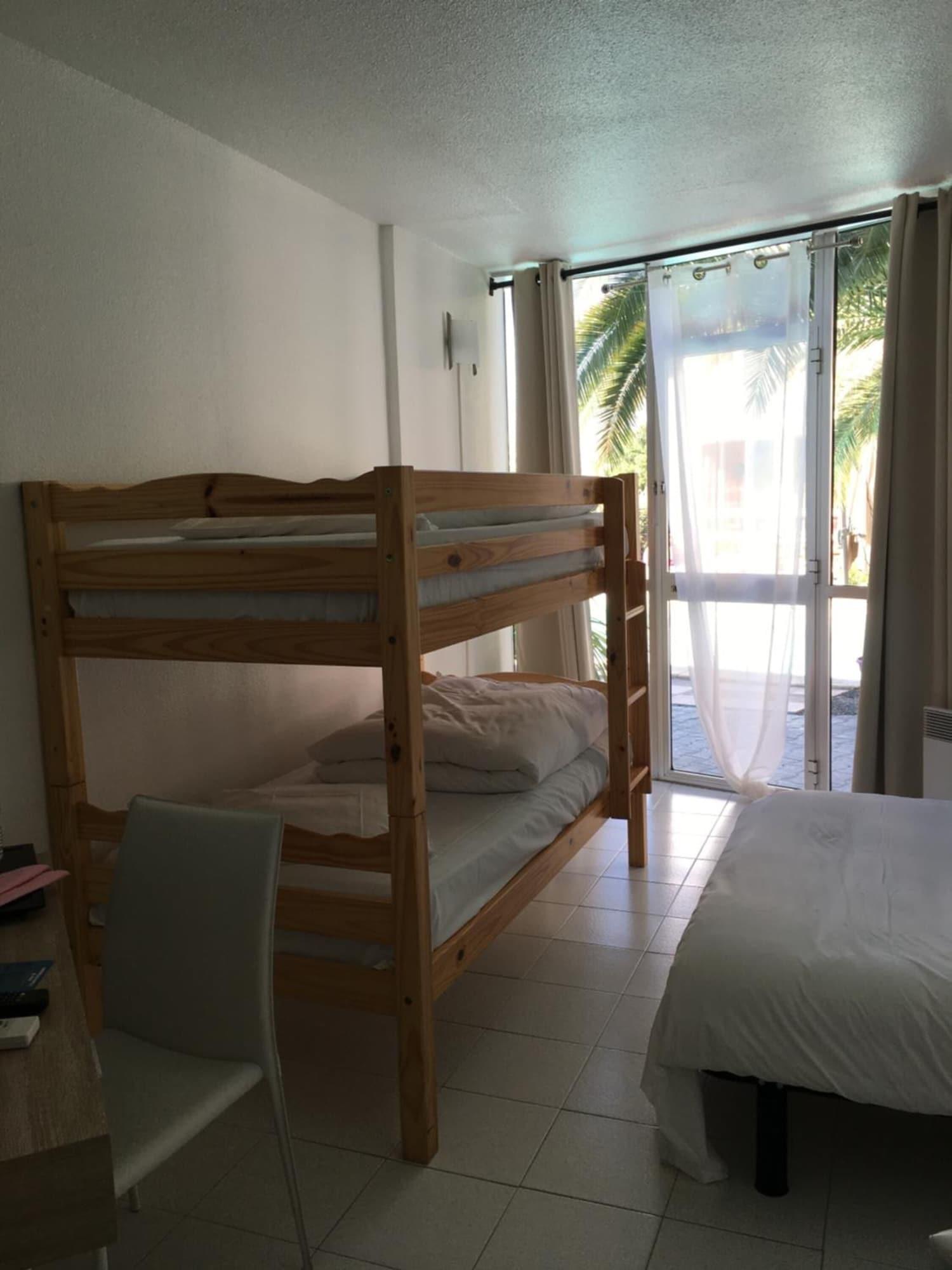 Habitación Hôtel la clé