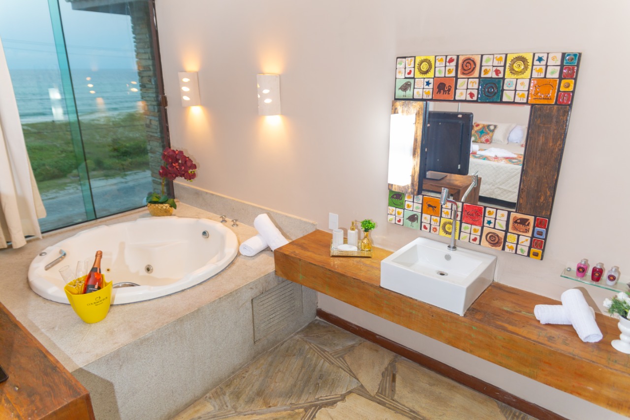 Baño OYO Pousada Bistro E Magnolia