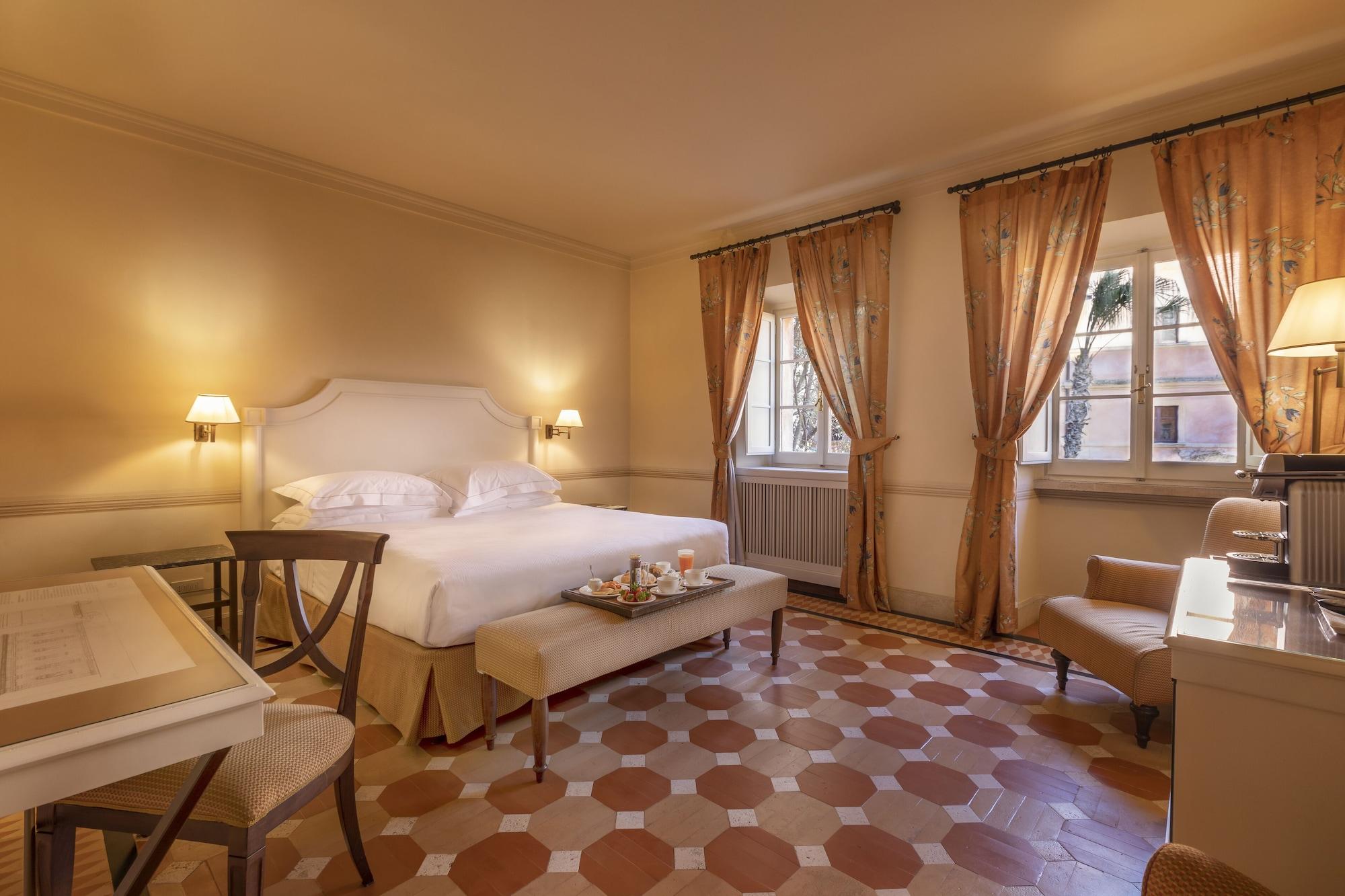 Habitación QC Grand Hotel Roma