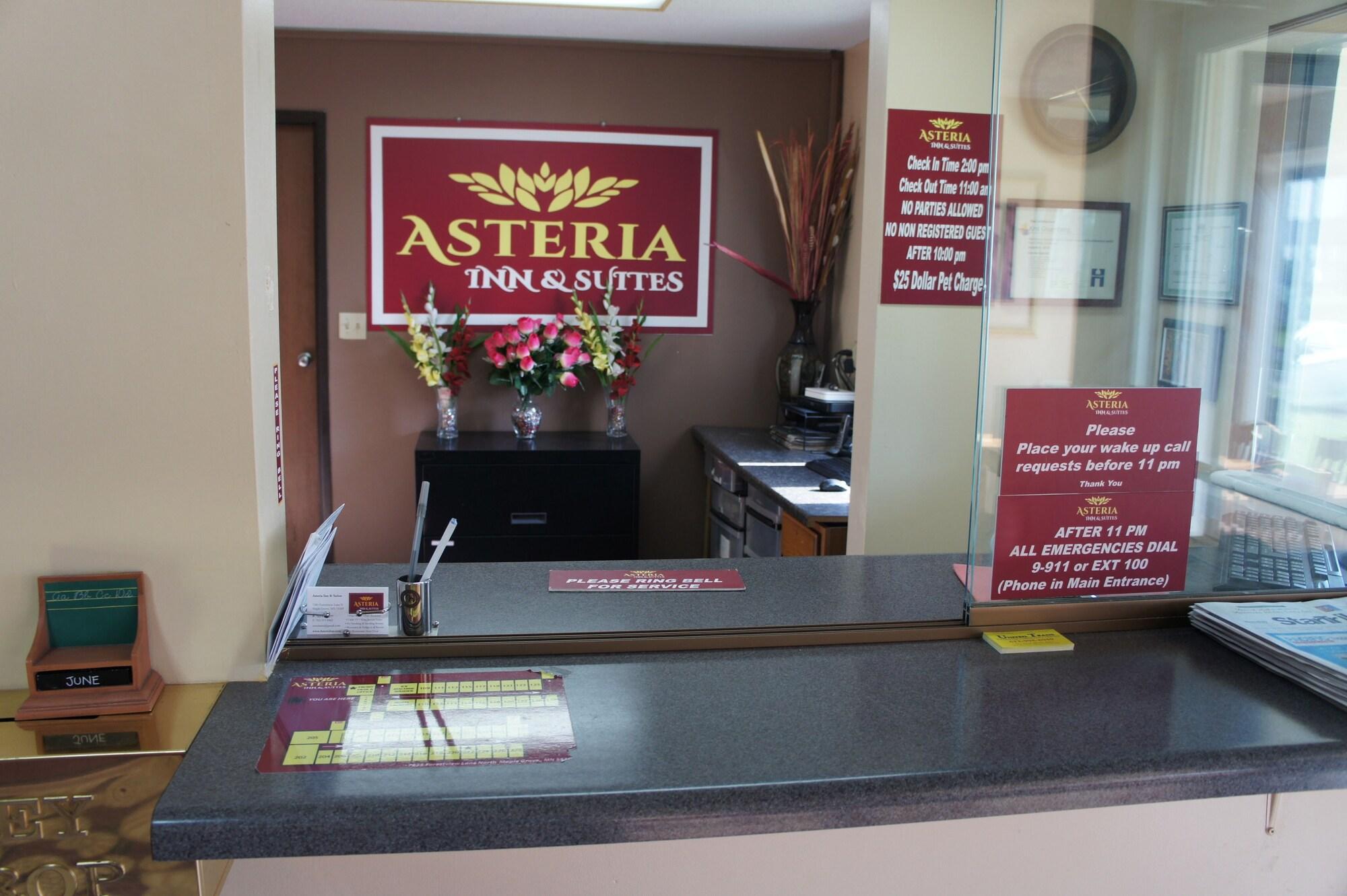 Vista Lobby Coratel Inn and Suites Maple Grove